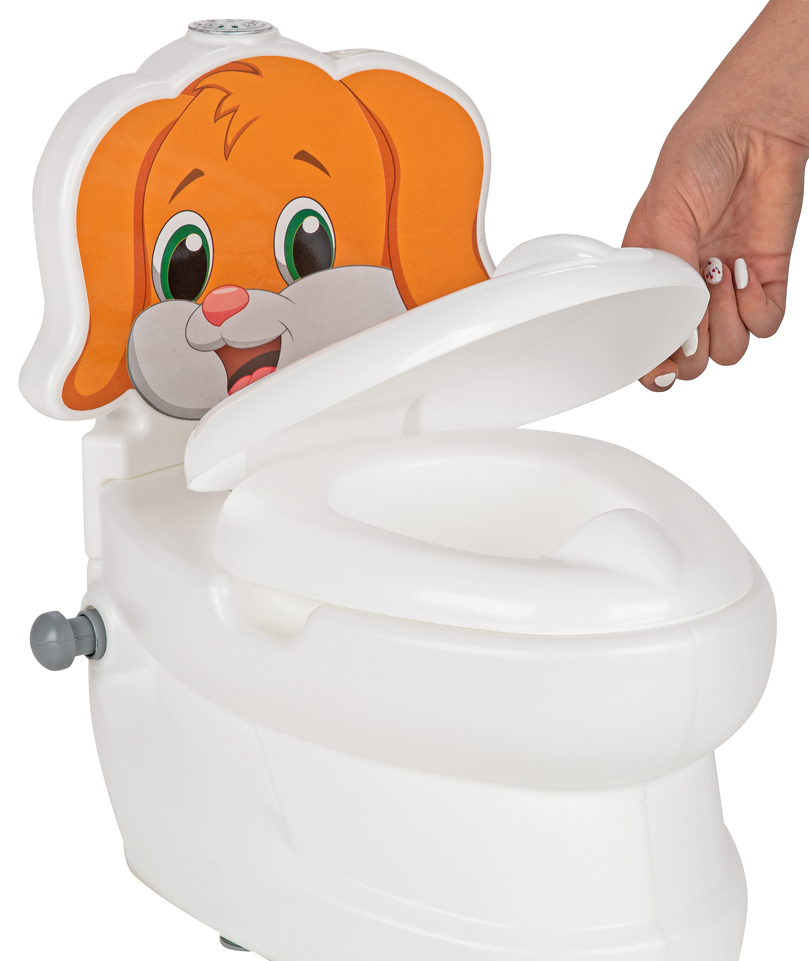 Ein weißer Kindertopf mit einem orangefarbenen Hundeaufdruck. Der Deckel ist offen.