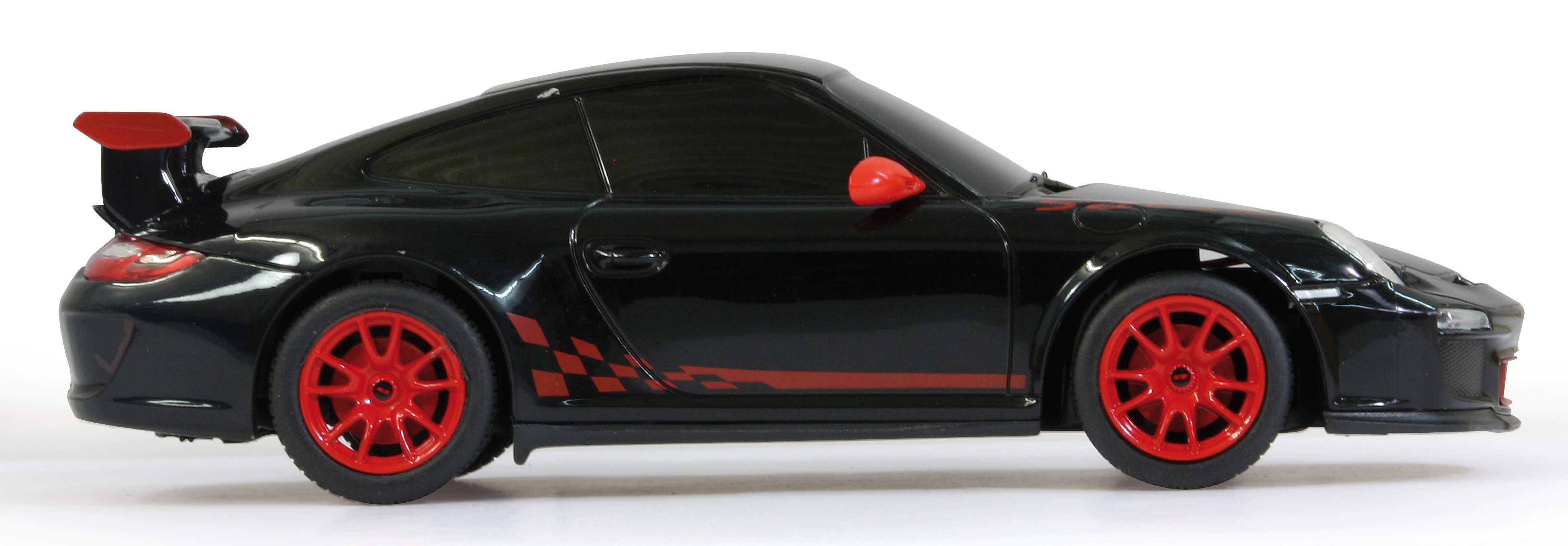 Schwarzes Spielzeugauto mit roten Felgen und Heckspoiler.