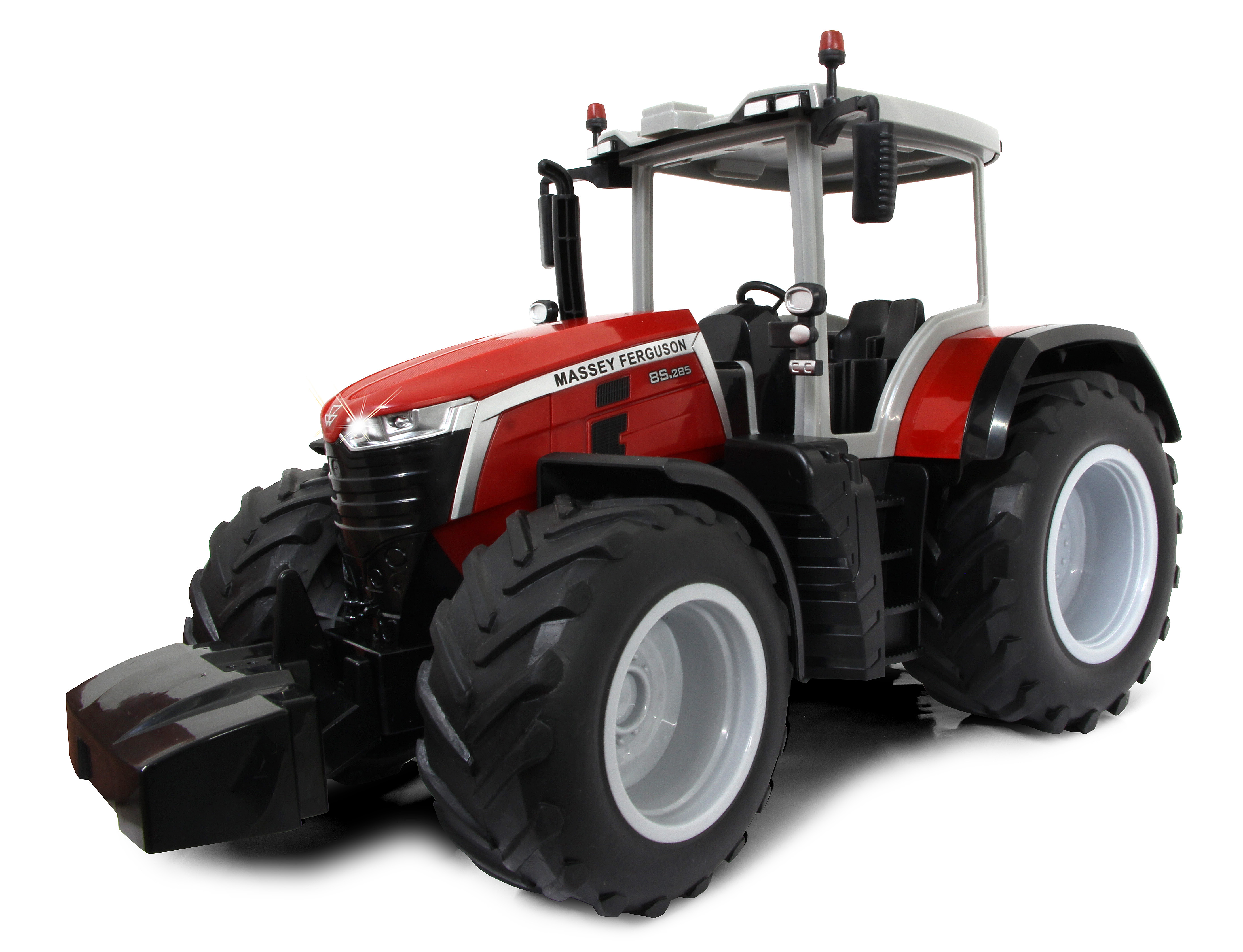 Ein roter Spielzeugtraktor mit großen Reifen und einem detaillierten Führerhaus.
