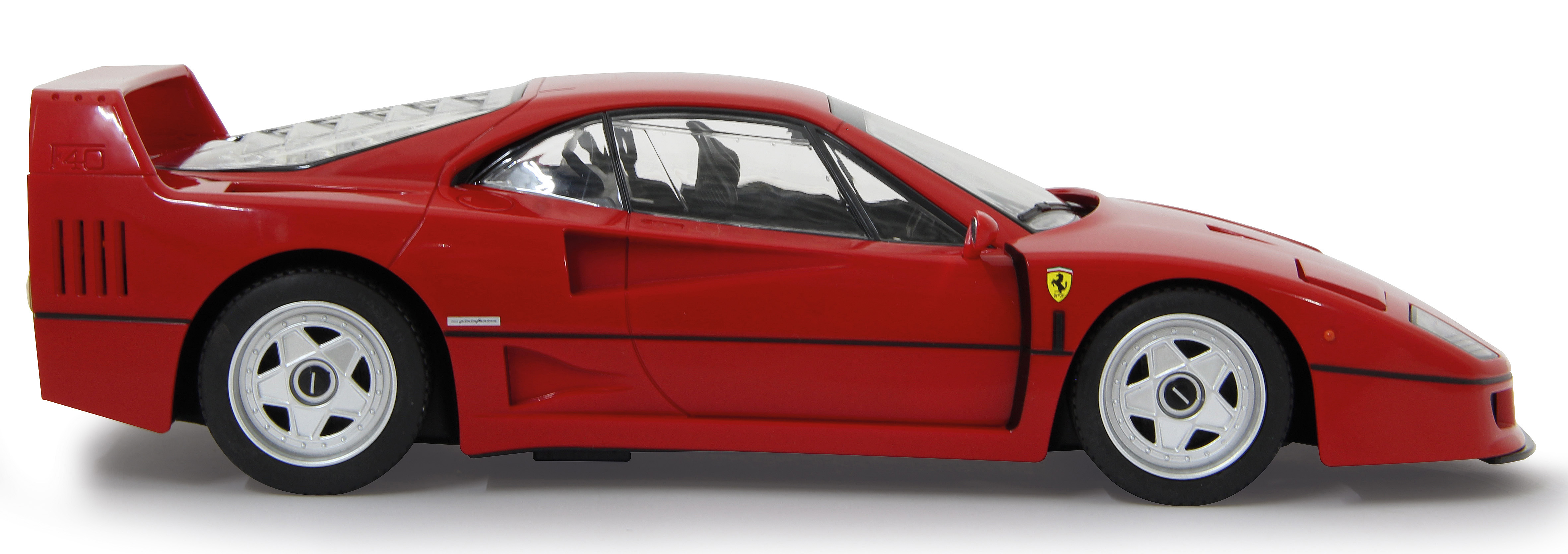 Roter Ferrari F40 Sportwagen von der Seite mit silbernen Felgen und schwarzem Spoiler.