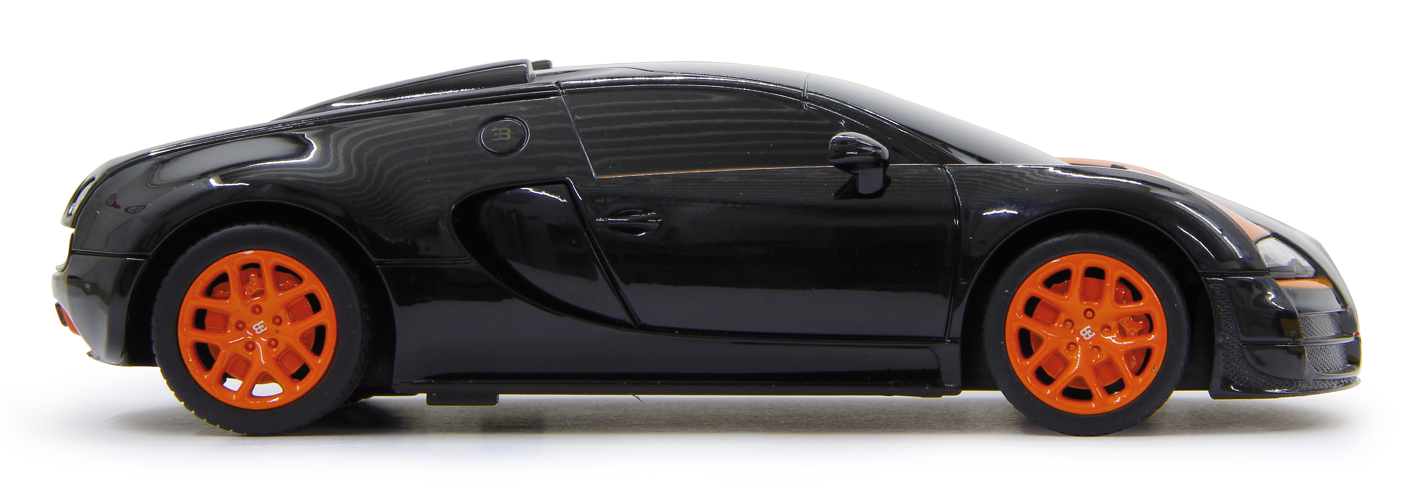 Schwarzes Spielzeugauto mit orangefarbenen Felgen, von der Seite gesehen.