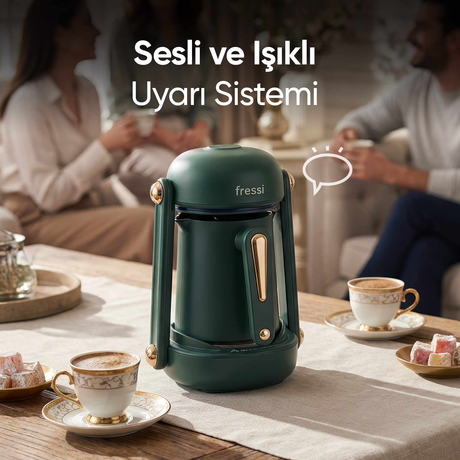Yeşil bir kahve makinesi, fincanlar ve tatlıların olduğu bir masada duruyor.