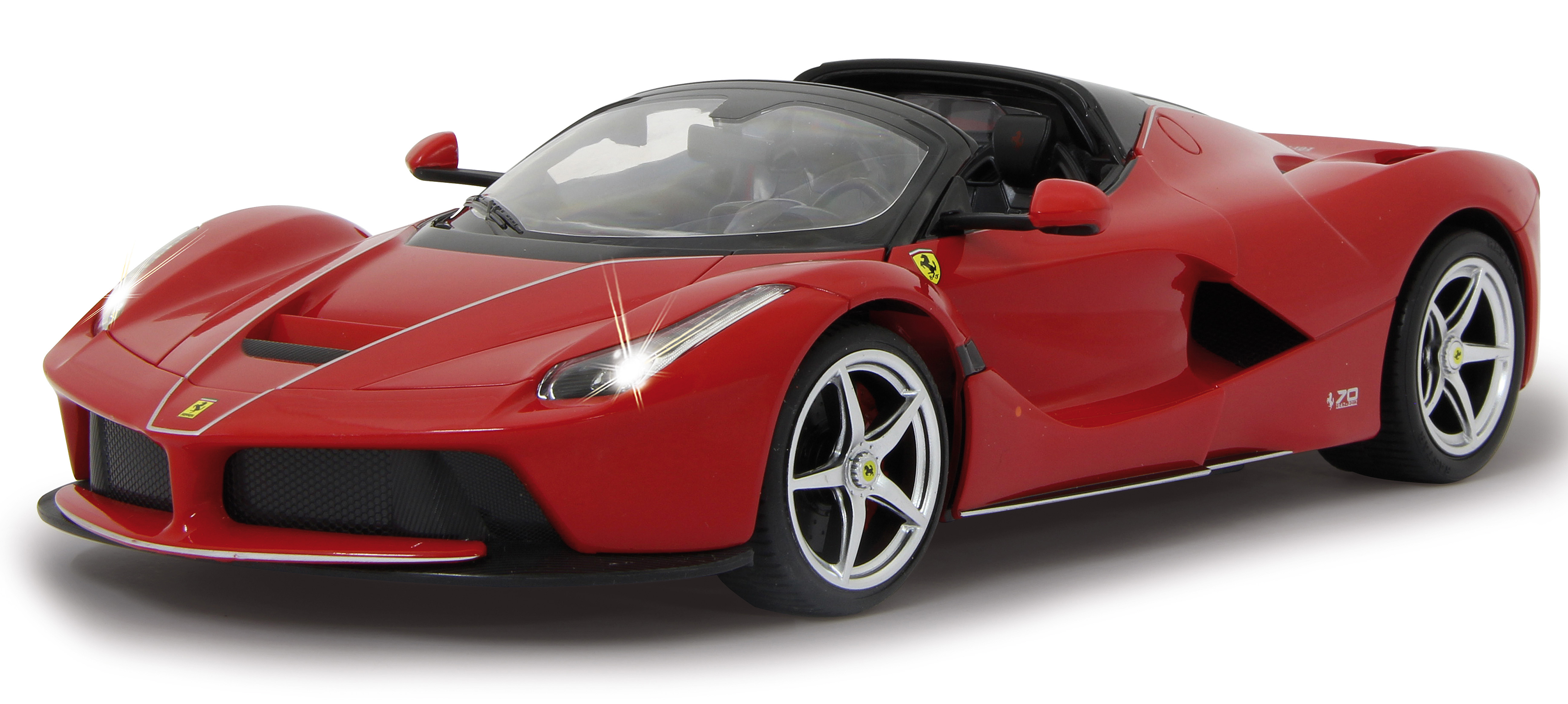 Ein roter Ferrari-Sportwagen mit offenem Verdeck, silbernen Felgen und schwarzen Details.