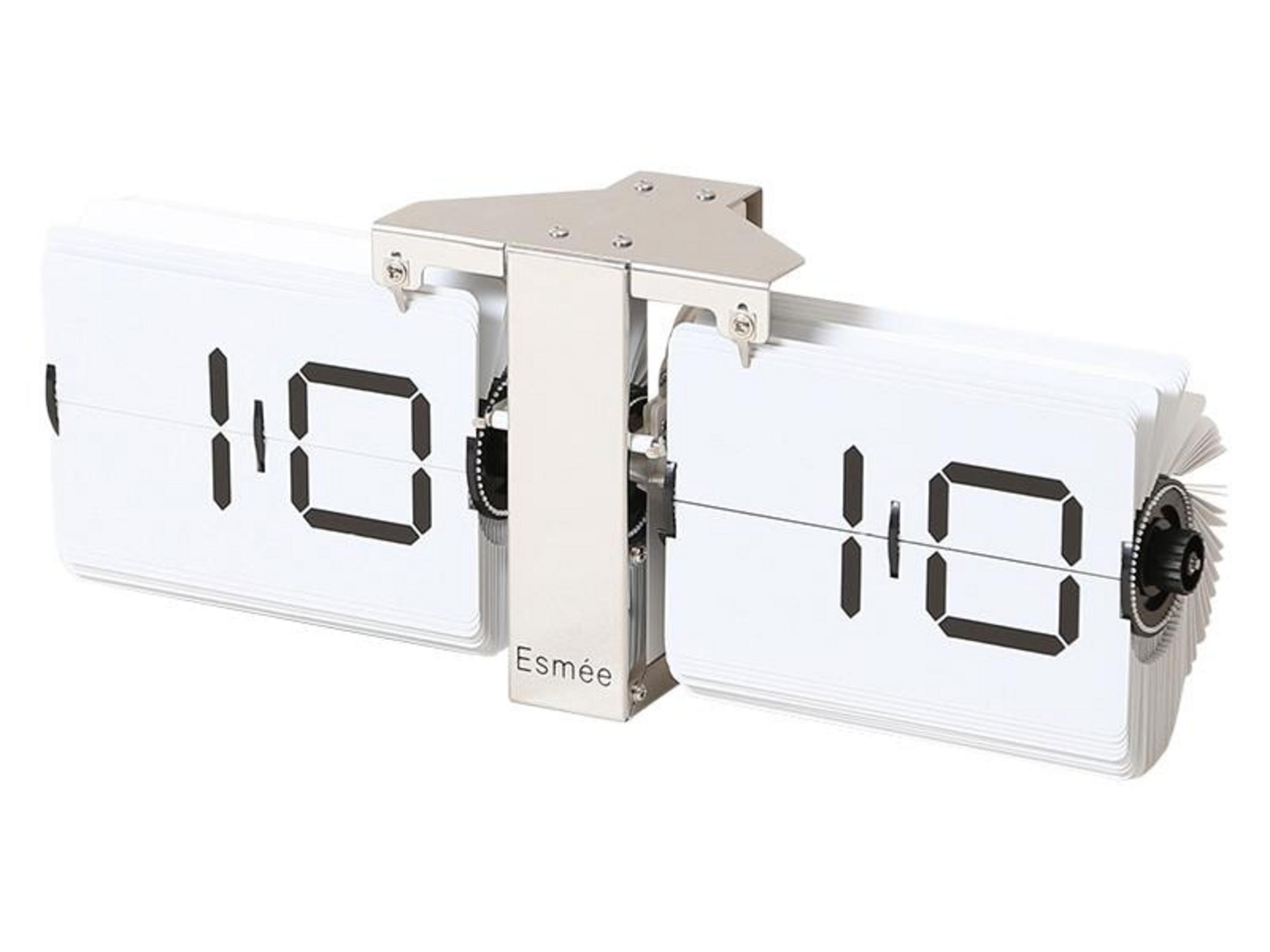 Un orologio flip bianco con cifre nere mostra le 10:10.