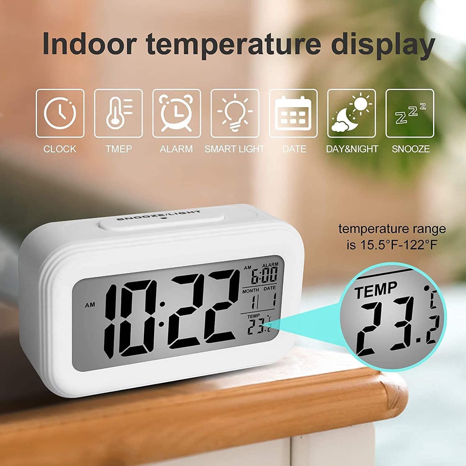 Ein weißer digitaler Wecker zeigt 10:22 Uhr und 23,8 Grad Celsius an.