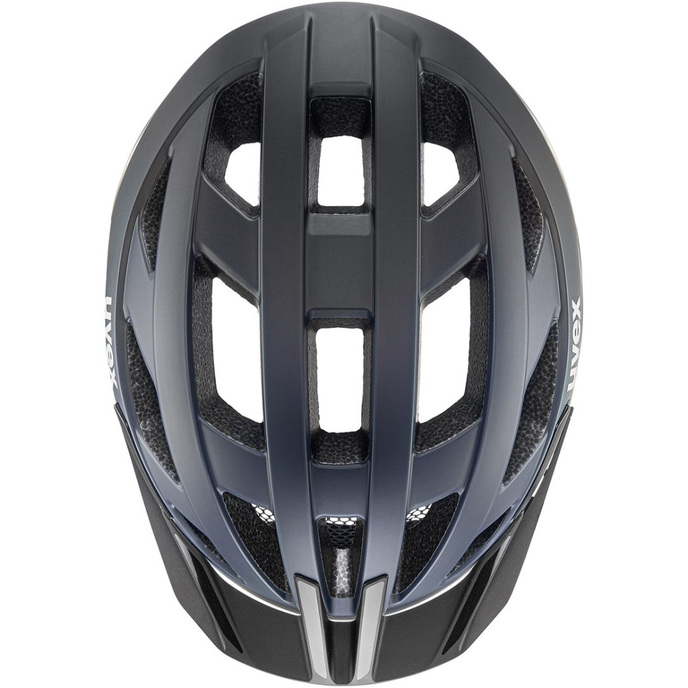 Ciemnoniebieski kask rowerowy z otworami wentylacyjnymi i logo UVEX.