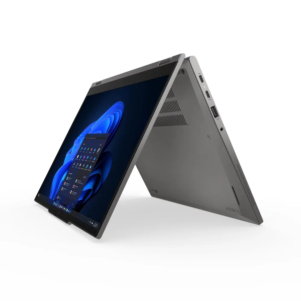 Gri, açık dönüştürülebilir dizüstü bilgisayar ekranında Windows 11 gösteriyor.