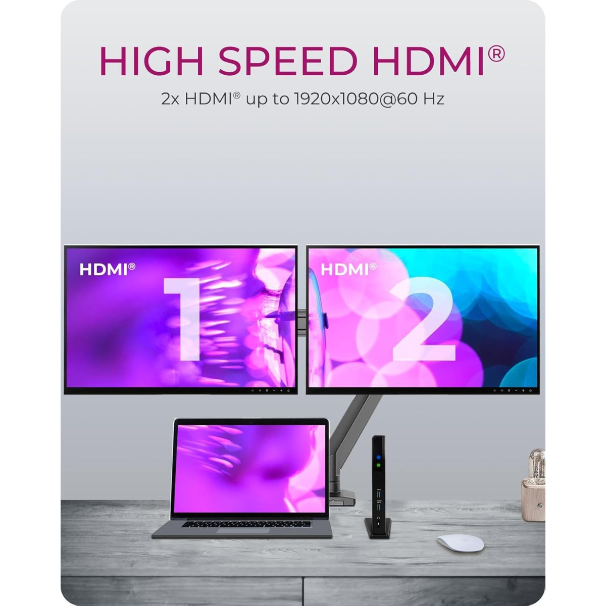 Zwei HDMI-Monitore, ein Laptop und ein kleiner PC stehen auf einem Schreibtisch.
