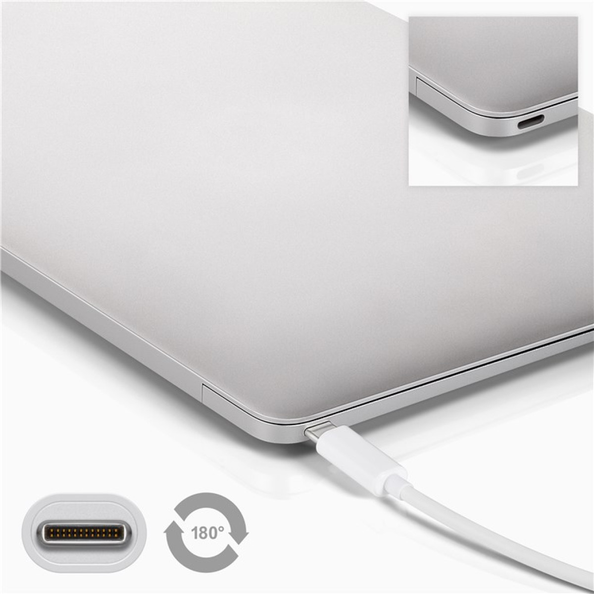 Silberner Laptop mit eingestecktem USB-C-Kabel. Nahaufnahme von Anschluss und Kabel.