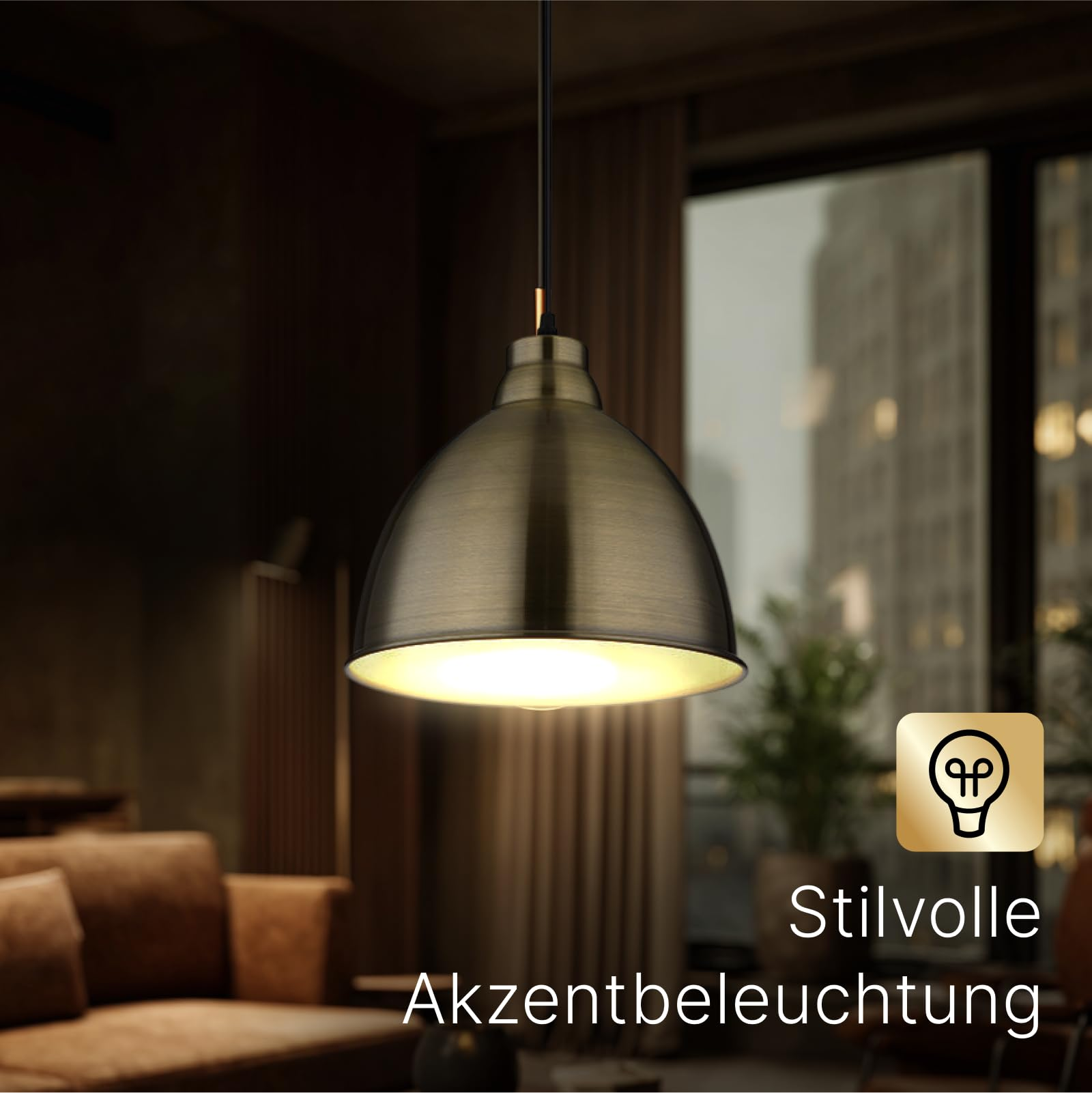Eine bronzefarbene Pendelleuchte hängt in einem gemütlichen Wohnzimmer.