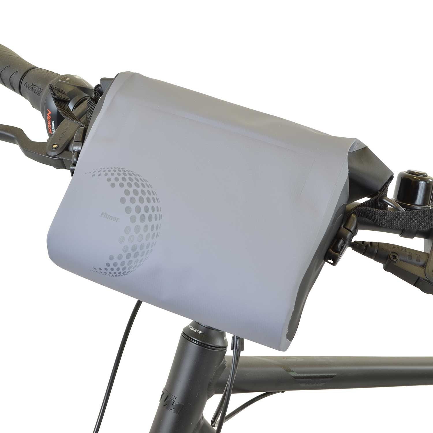 Graue Lenkertasche mit Kreisdesign, montiert an einem Fahrradlenker mit Schalthebel.
