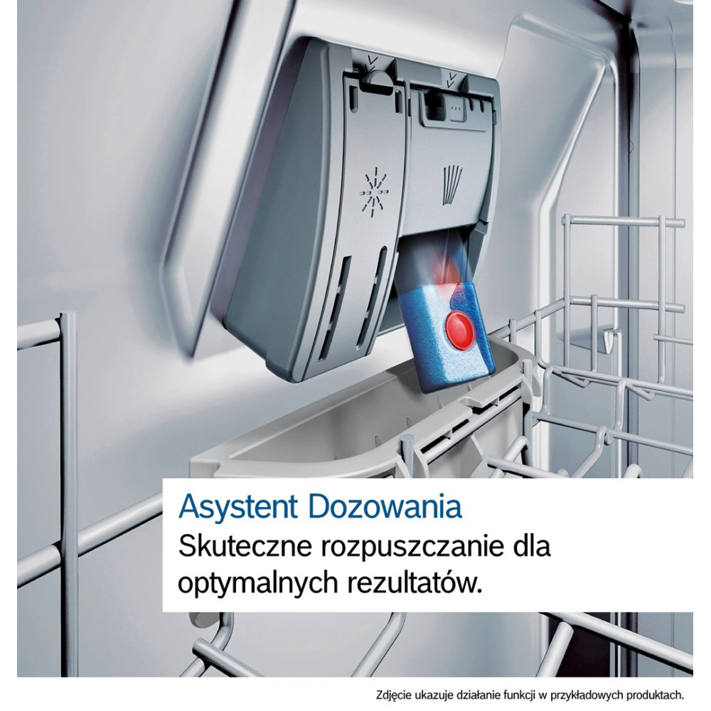 Pojemnik na detergent do zmywarki z niebieską tabletka i czerwonym guzikiem.