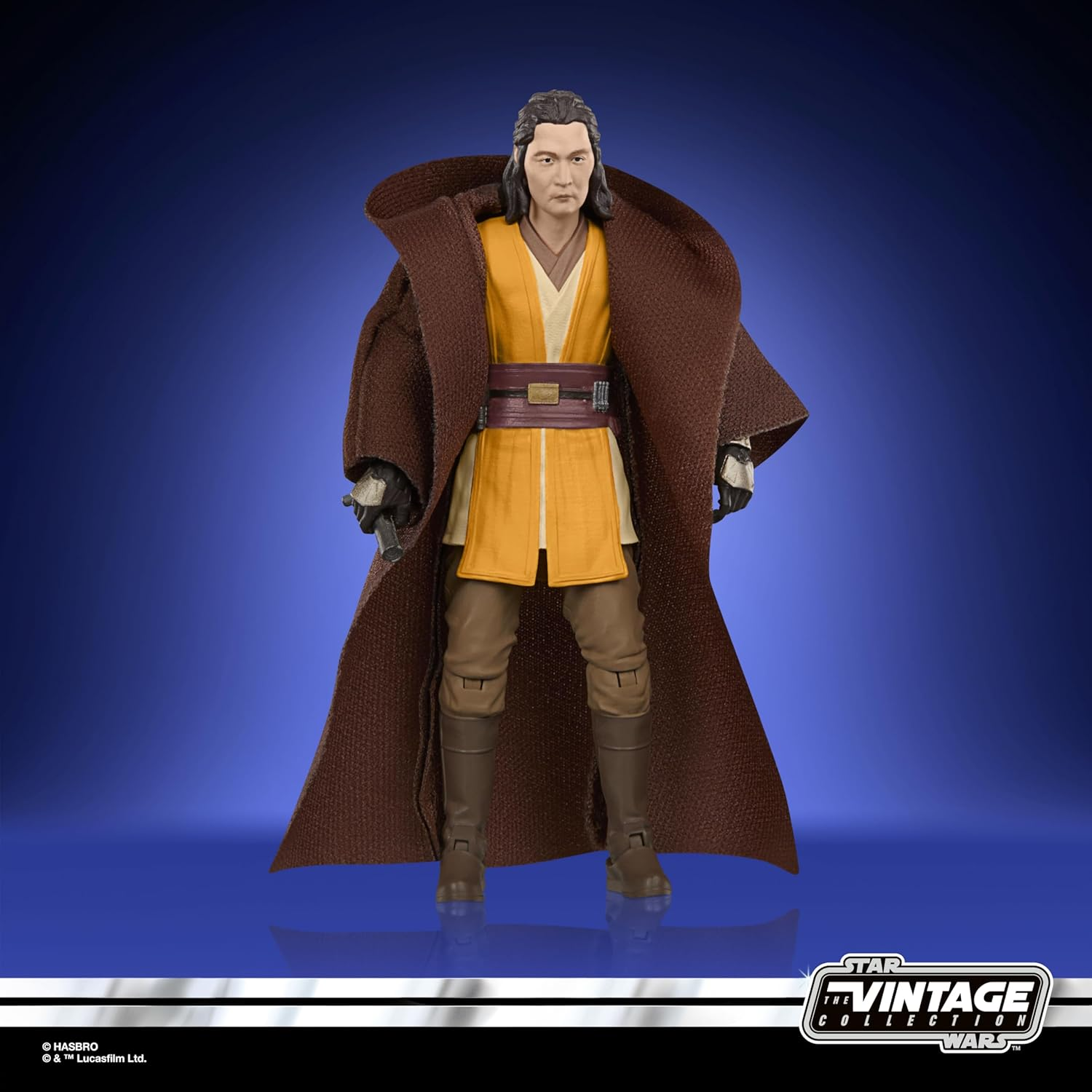Star Wars Figur von Obi-Wan Kenobi in braunem Umhang, gelber Tunika, brauner Hose.
