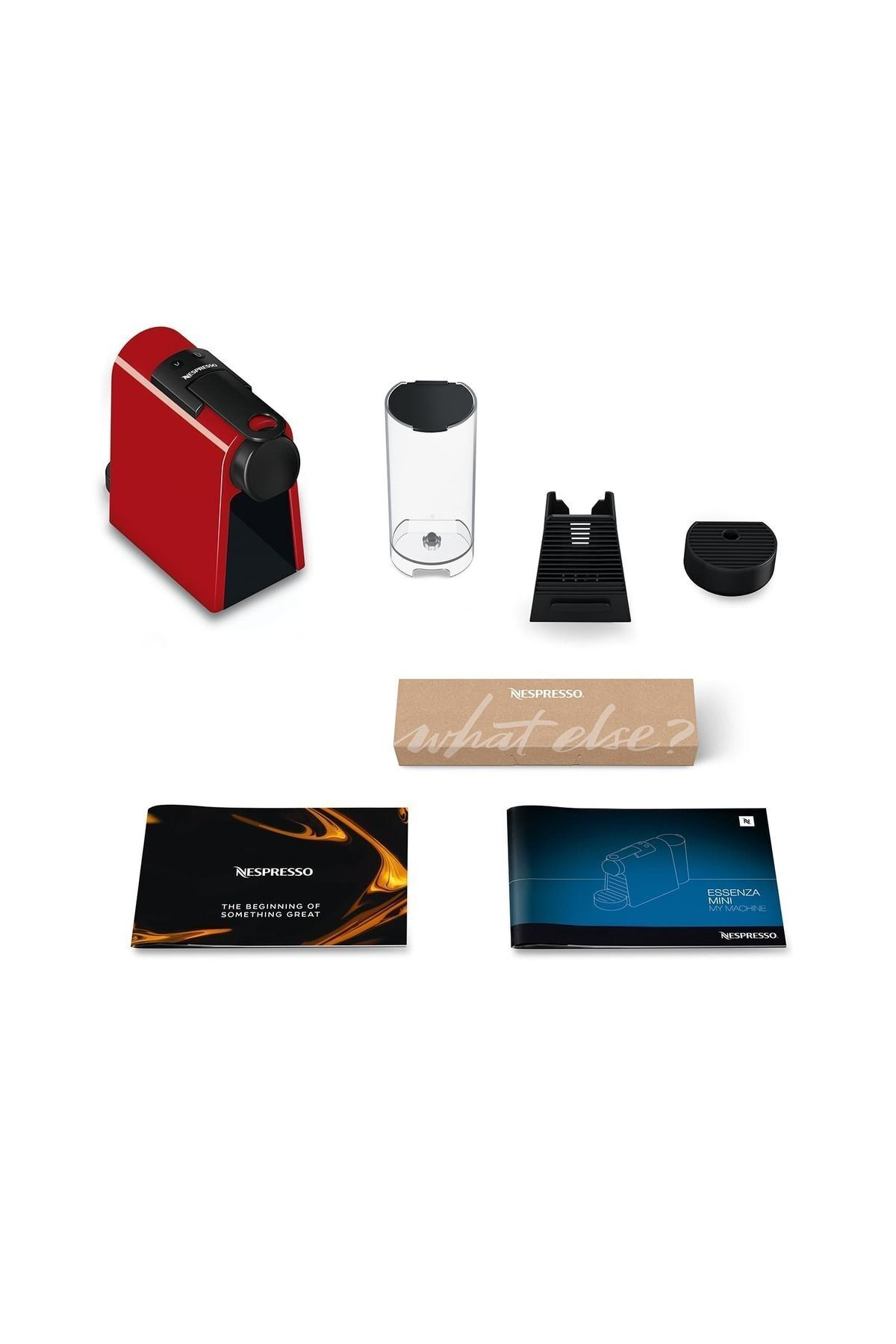 Beyaz arka planda aksesuarlar ve kılavuzlarla birlikte kırmızı Nespresso makinesi.