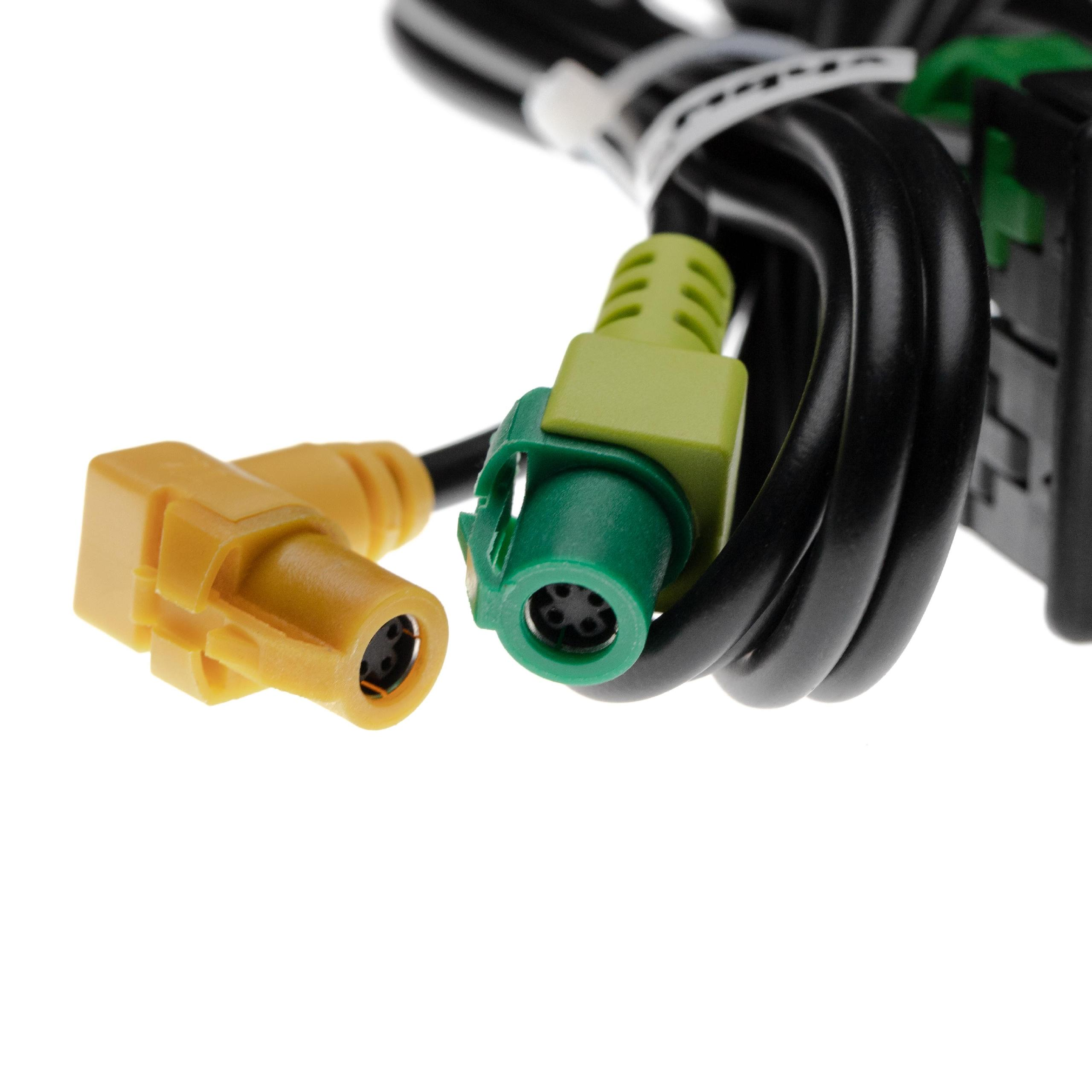 Ein gelber und ein grüner Stecker mit schwarzen Kabeln auf weißem Hintergrund.