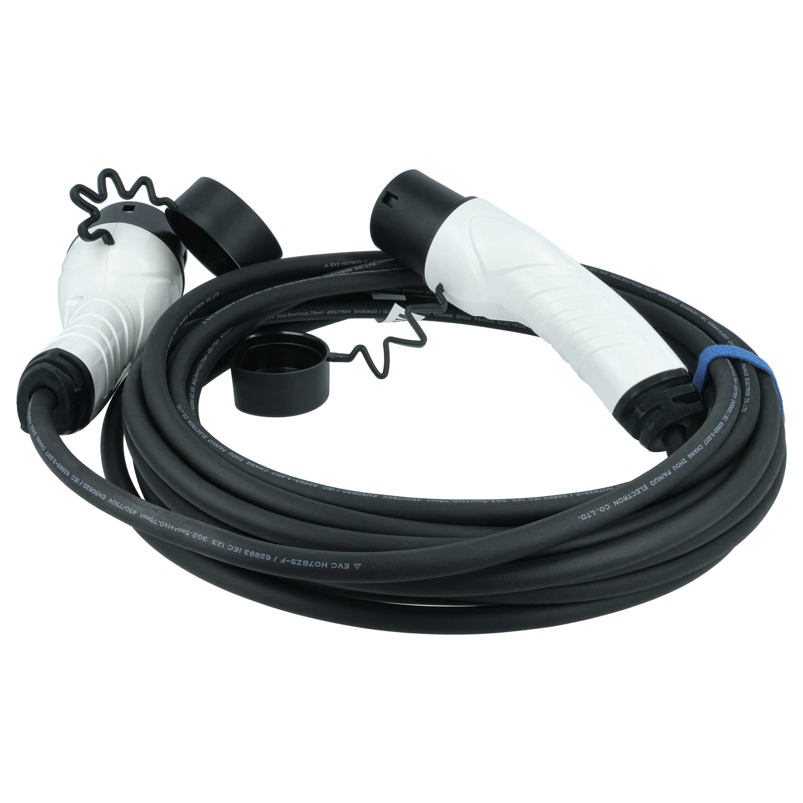 Ein schwarzes Kabel mit weißen Steckern und Kappen, aufgerollt.