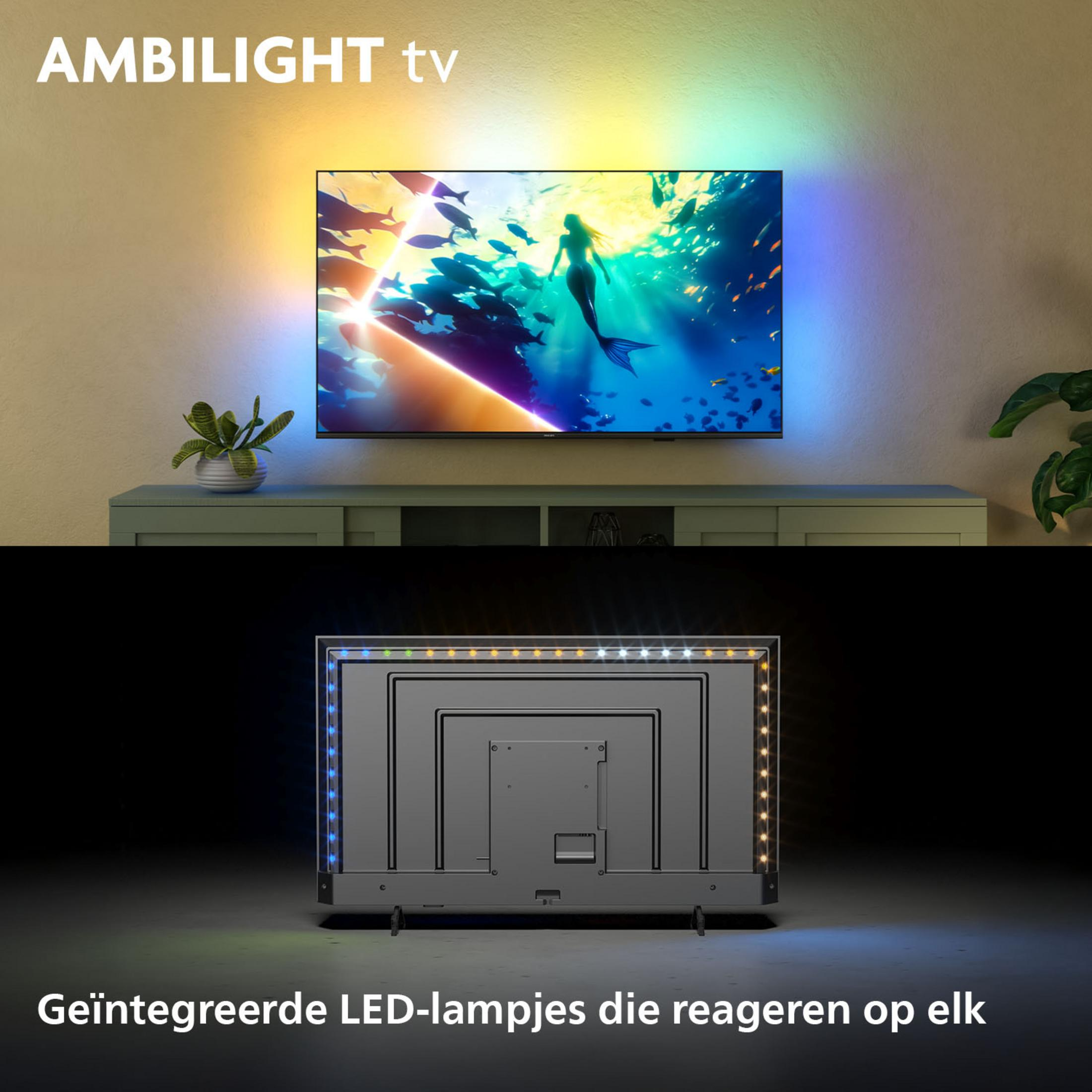 Un téléviseur avec Ambilight, affichant une scène sous-marine avec une sirène et des poissons.