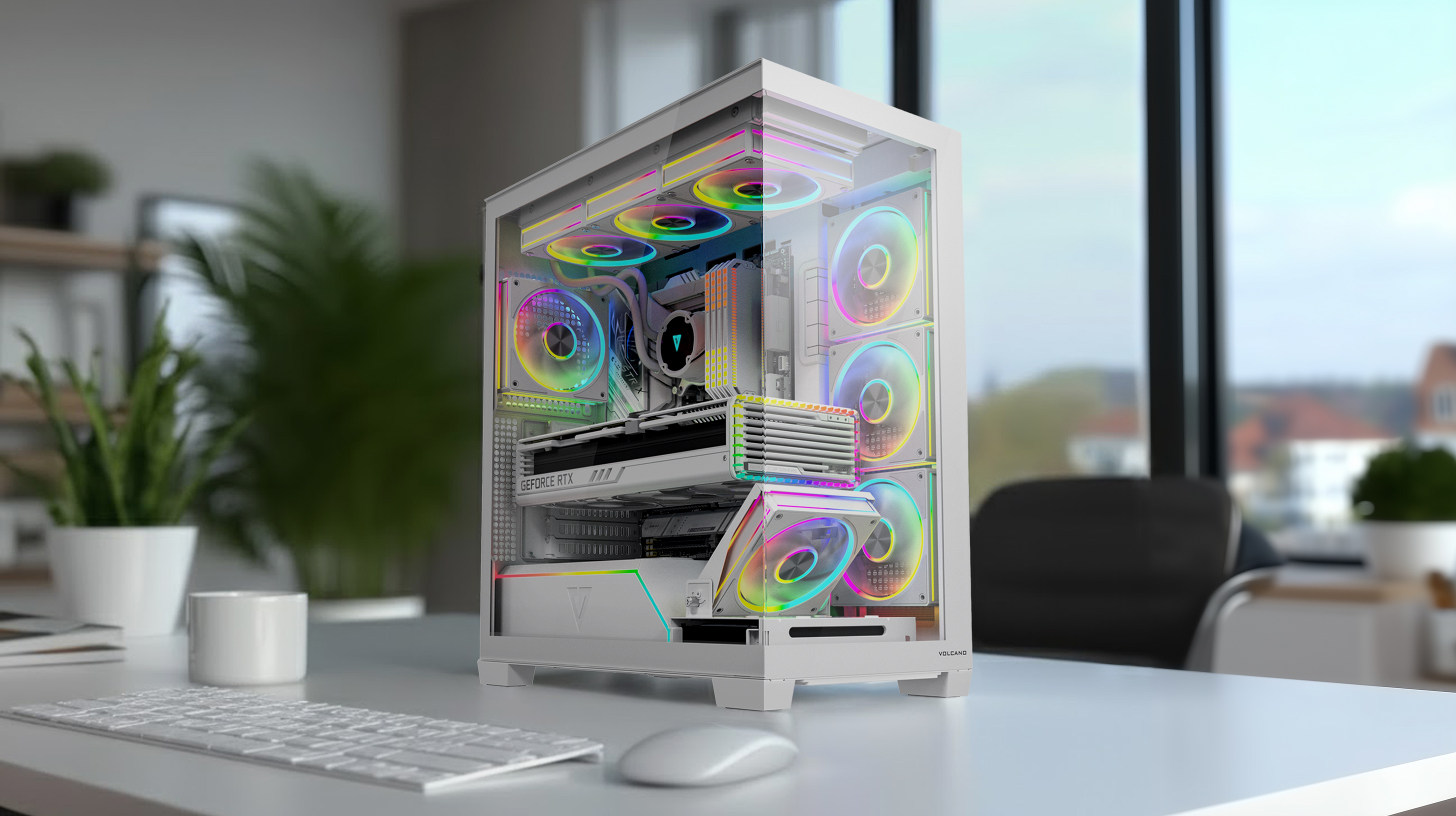 Biały komputer gamingowy z wentylatorami RGB na biurku z klawiaturą i myszką.