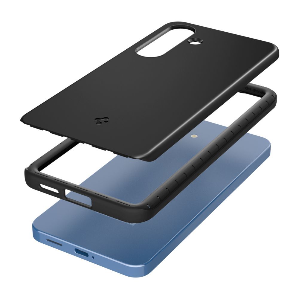 Custodia nera per telefono smontata su un telefono blu.