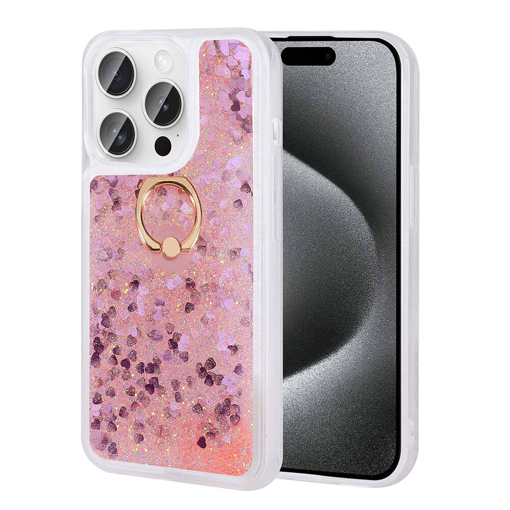 Altın halka standlı pembe simli kalp telefon kılıfı, karanlık telefon ekranının yanında.