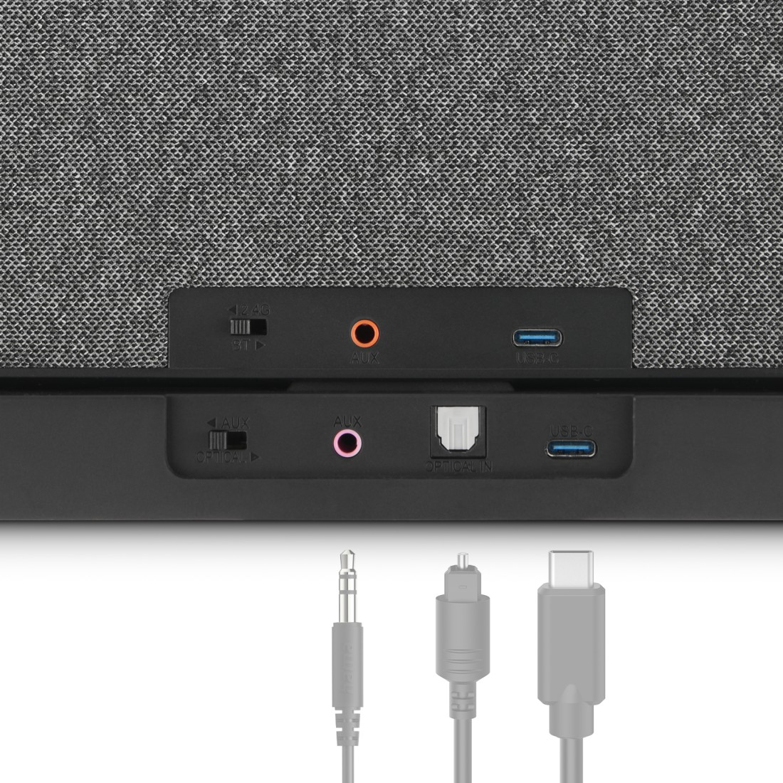 Porty głośnika: AUX, optyczne, USB-C i przełącznik Bluetooth. Poniżej kable.