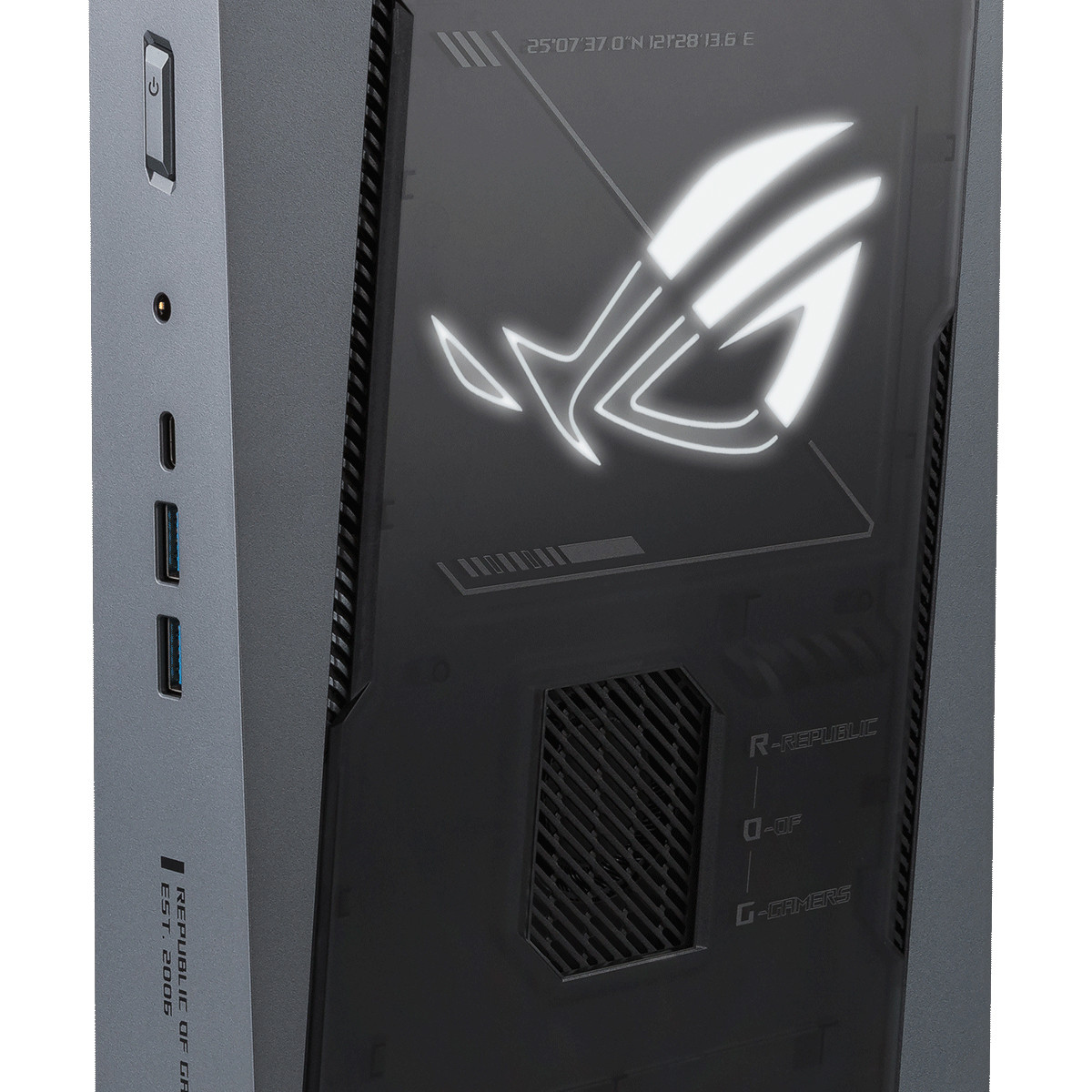 Un case PC grigio con logo ROG luminoso e porte.