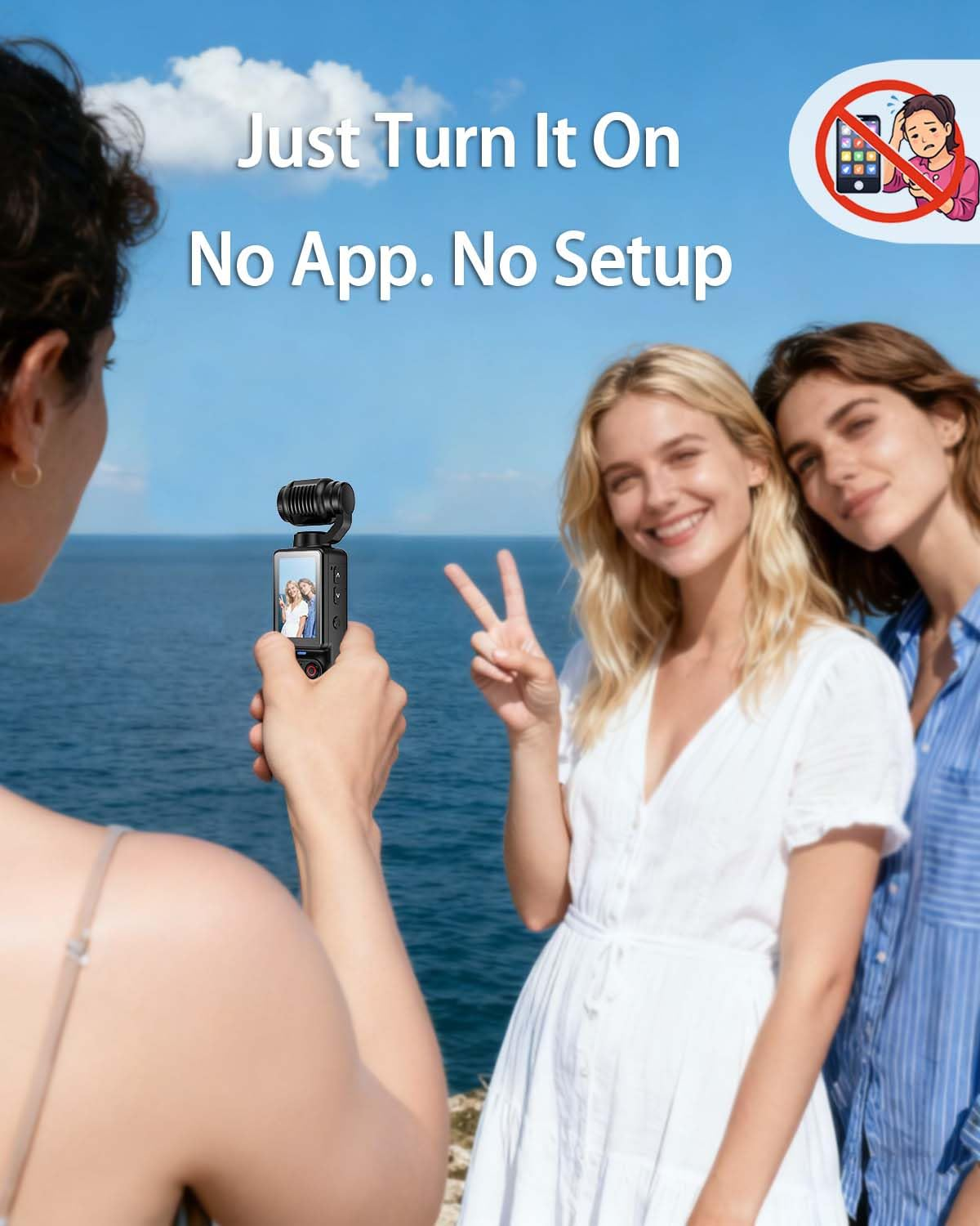 Zwei Frauen am Meer, eine hält eine Kamera. "Just Turn It On".