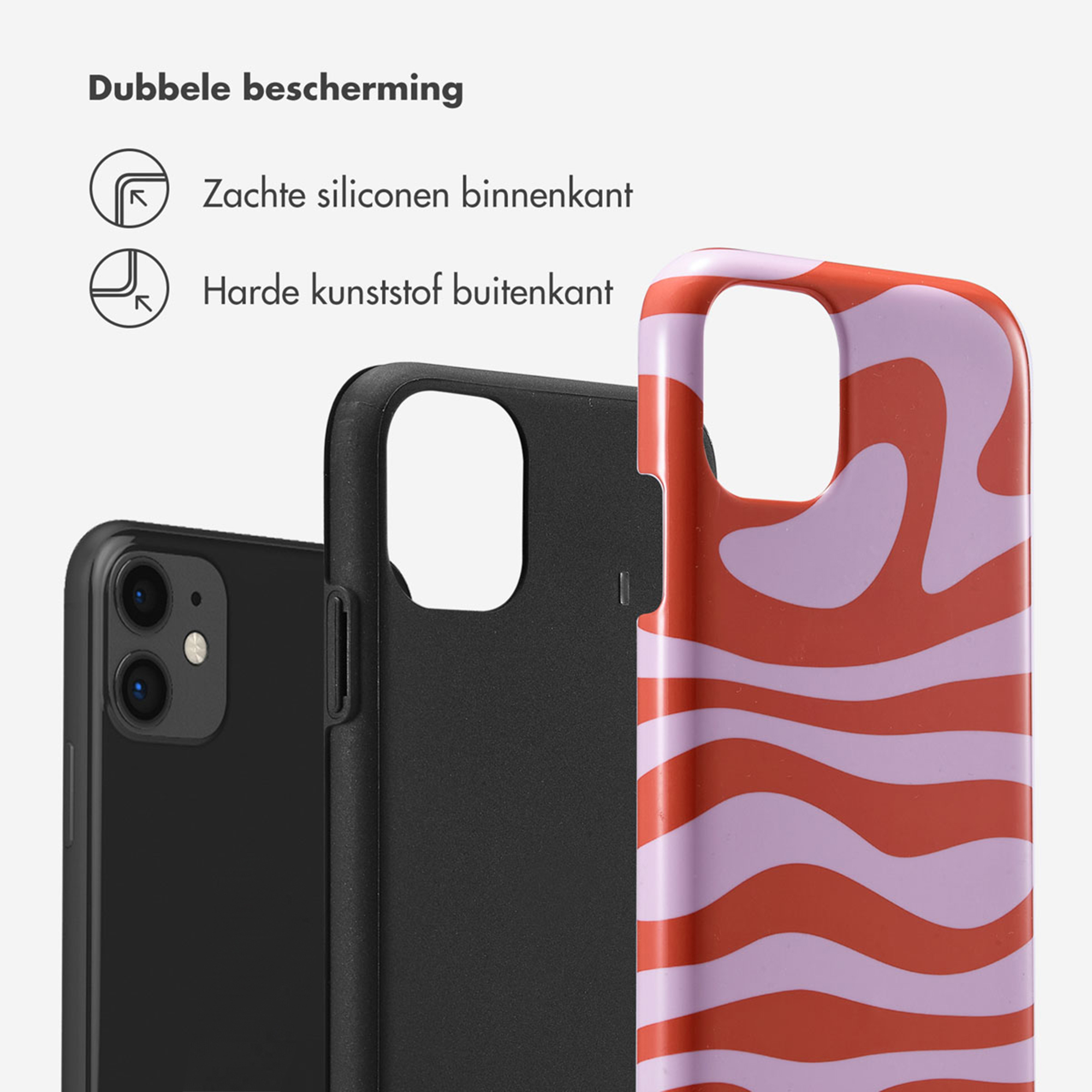 Zwarte telefoon met twee telefoonhoesjes ernaast, één zwart, één met patroon.