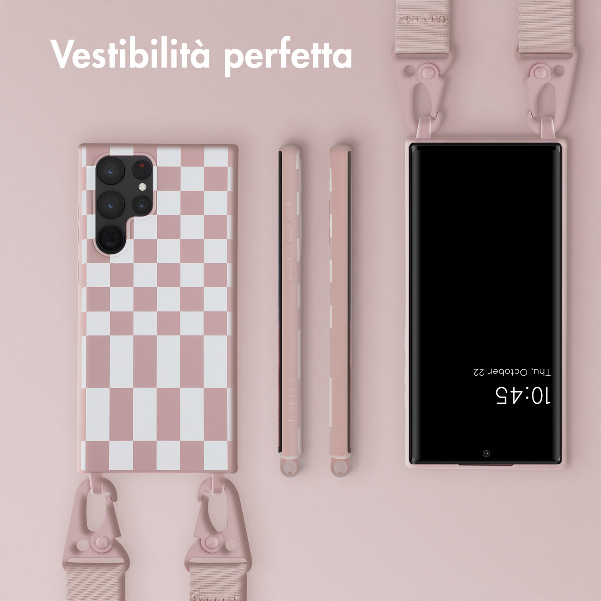 Un telefono con custodia a scacchi e un cinturino accanto.