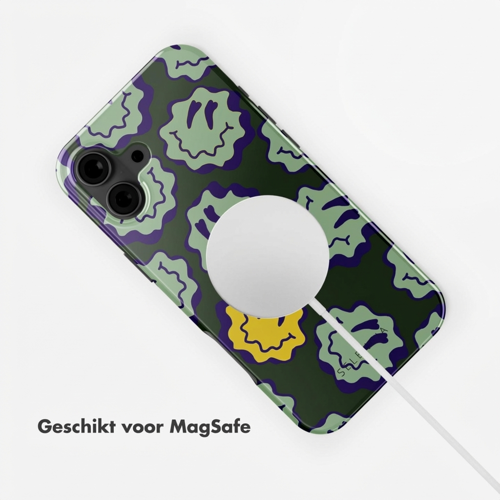 Cover per telefono verde scuro con faccine sorridenti viola e verde chiaro e caricatore MagSafe.