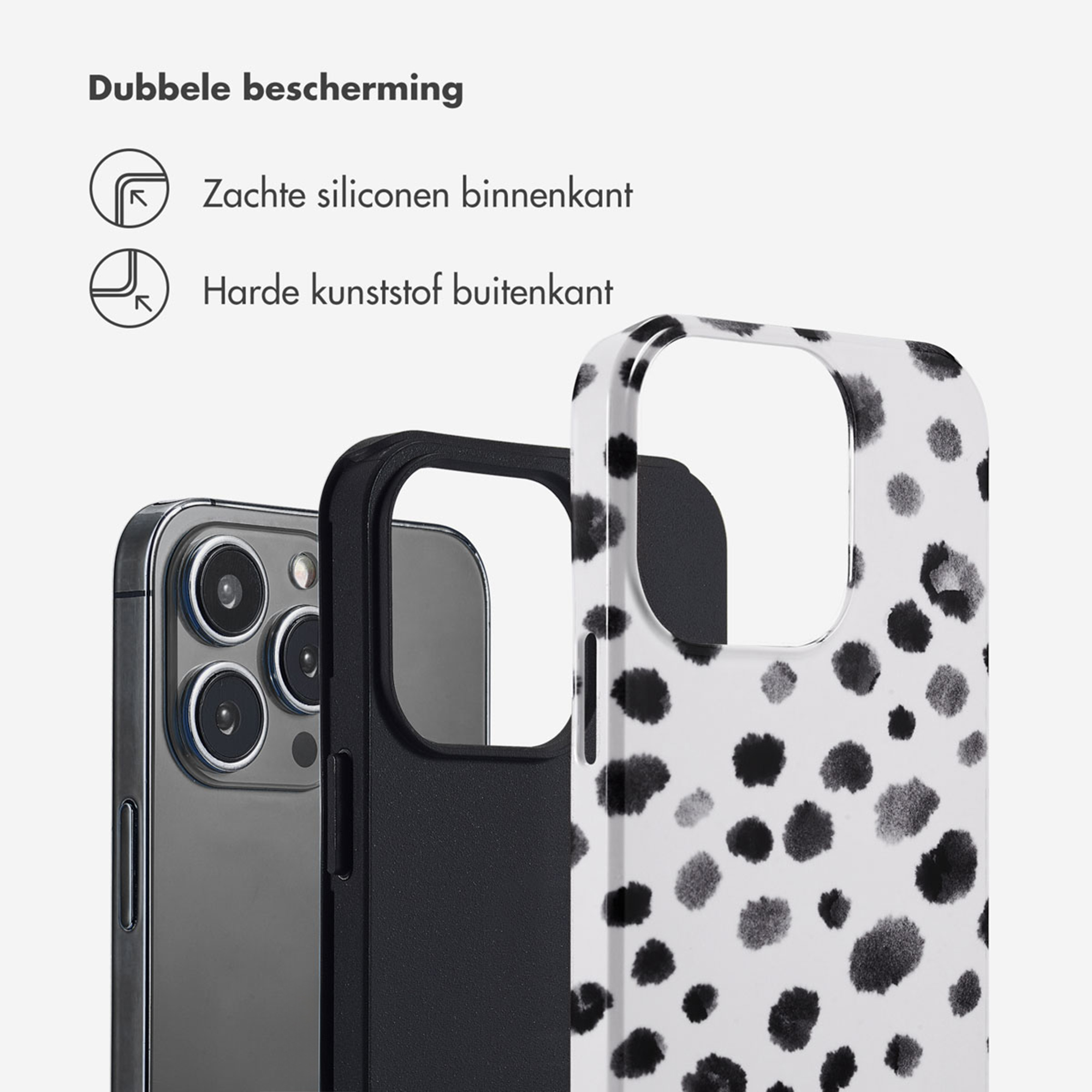 Zwart-witte telefoonhoes met vlekkenpatroon en zwarte binnenlaag.