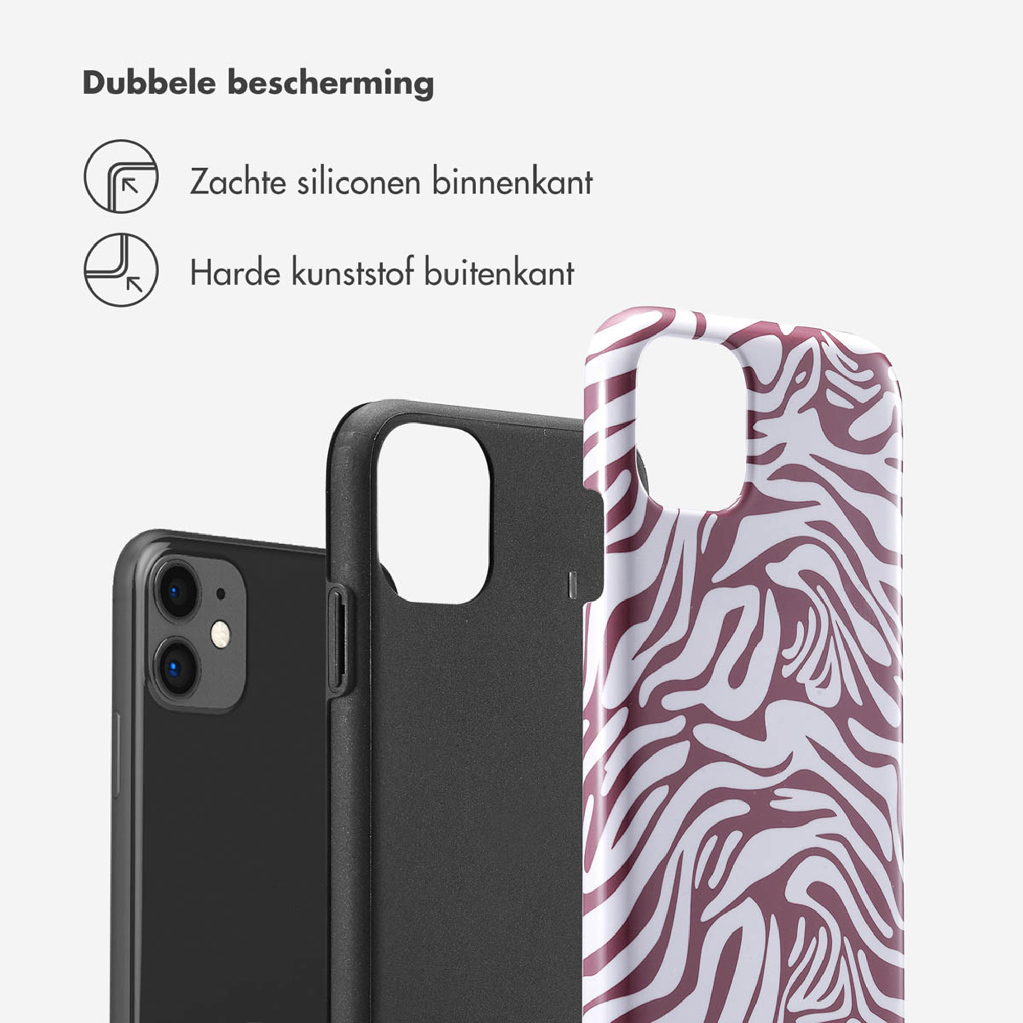 Een zwarte iPhone en een telefoonhoes met zebraprint.