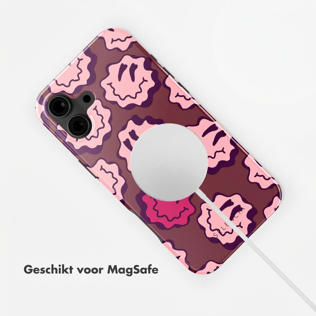 Custodia per telefono marrone con motivo smiley rosa e anello MagSafe.