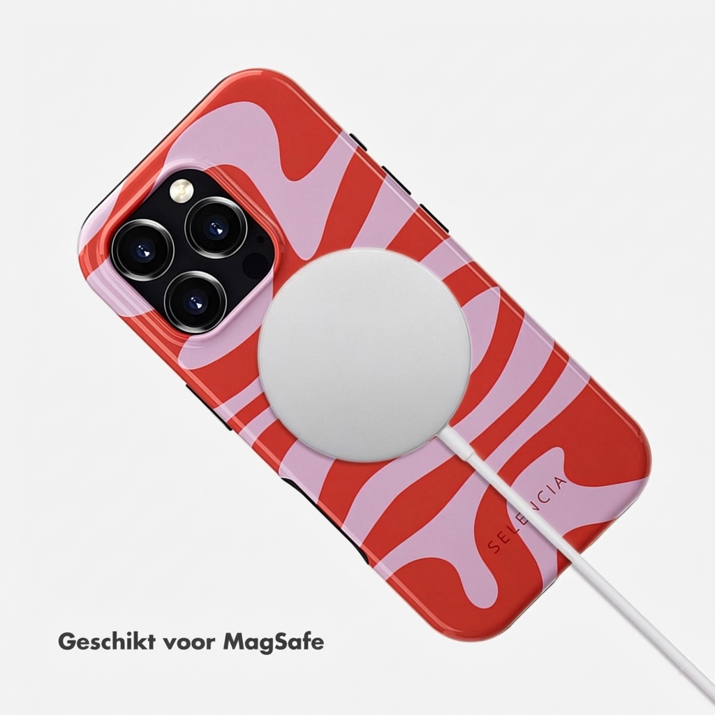 Telefoonhoesje met rood en roze golvend patroon, MagSafe-oplader en kabel.