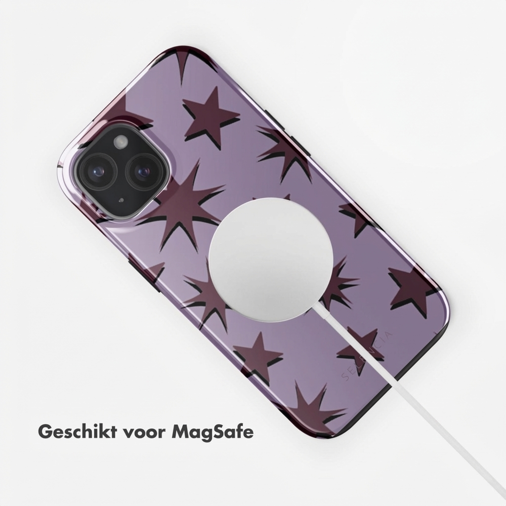 Een paarse telefoonhoes met donkere sterren en MagSafe-oplader.