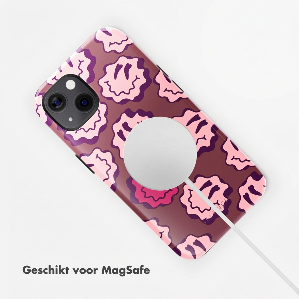 Coque iPhone avec motif smiley psychédélique, compatible MagSafe.