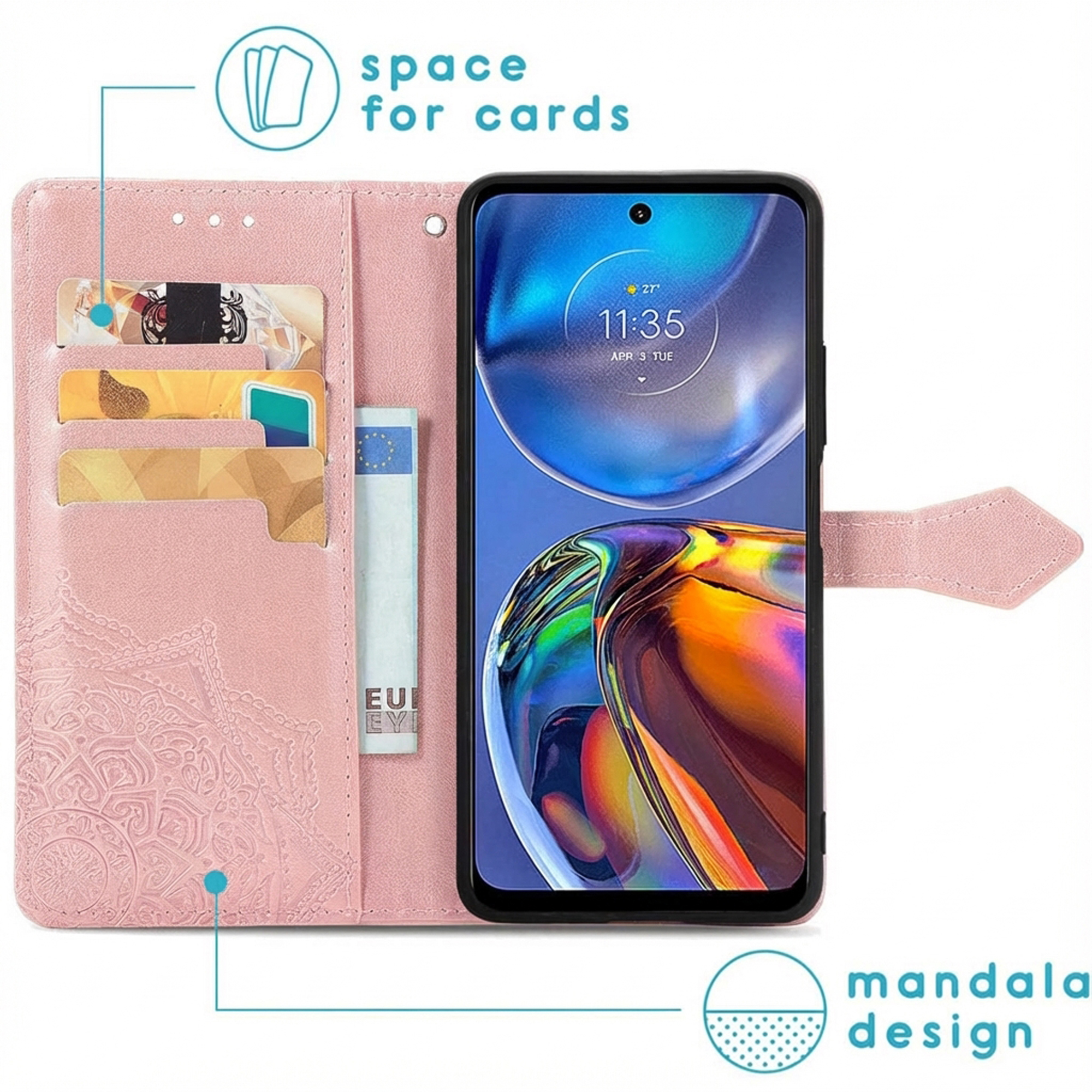 Roze telefoonhoesje met kaartsleuven en mandala-ontwerp. Toont telefoon.