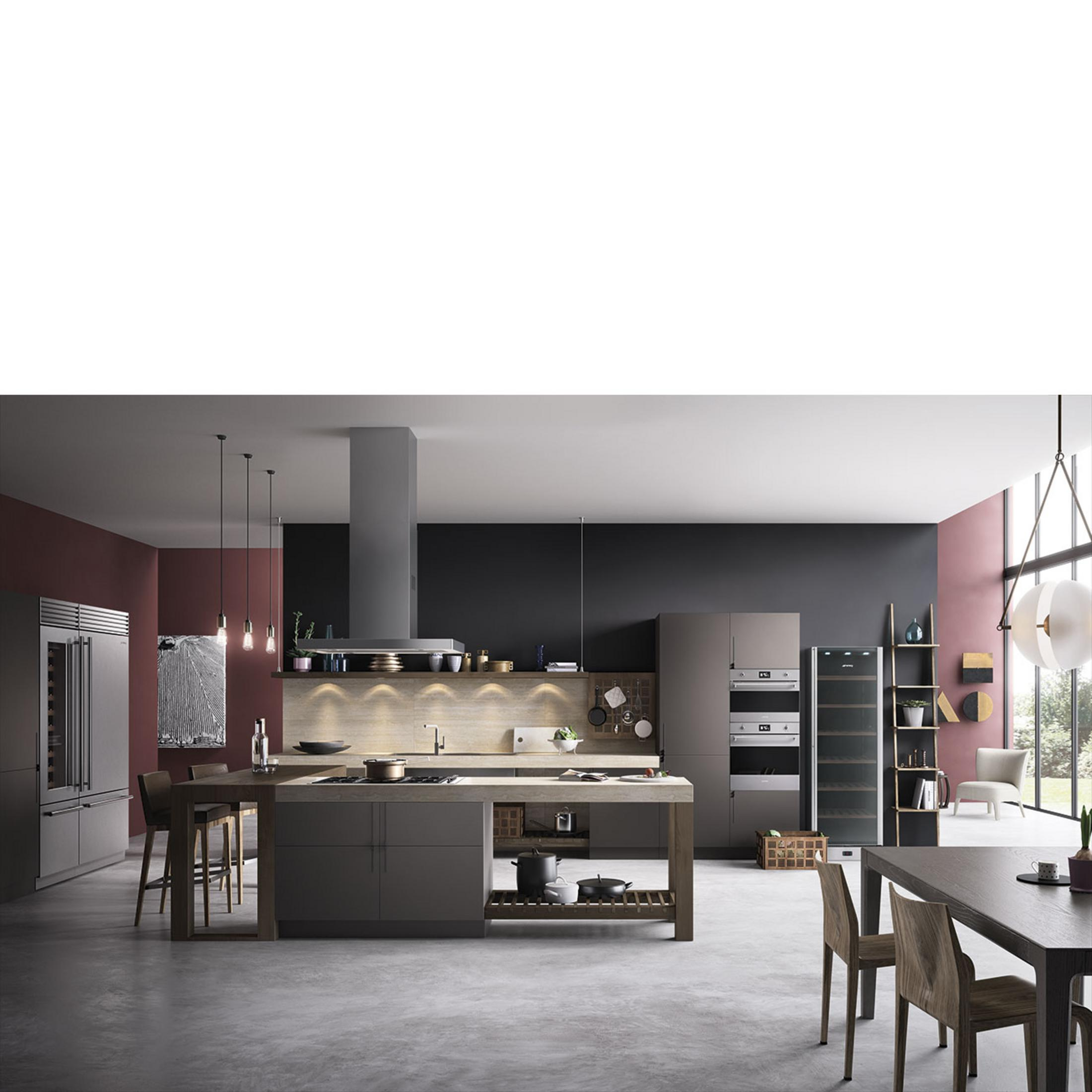 Cocina moderna con isla, comedor y grandes ventanales.