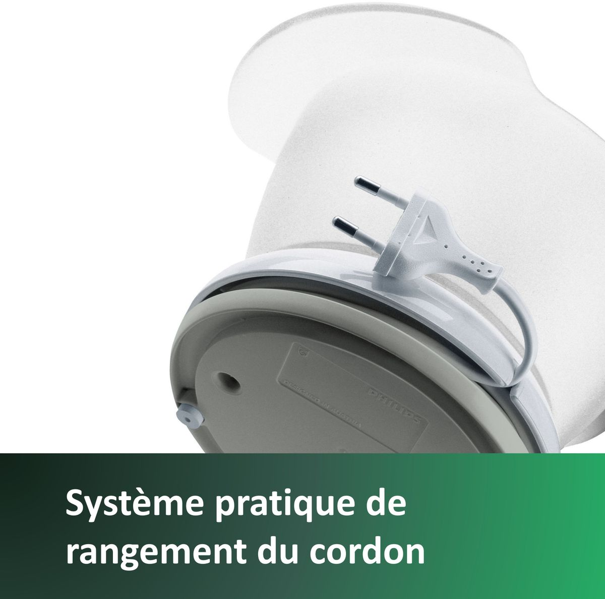 A white plug with a cord attached to a white and gray device.