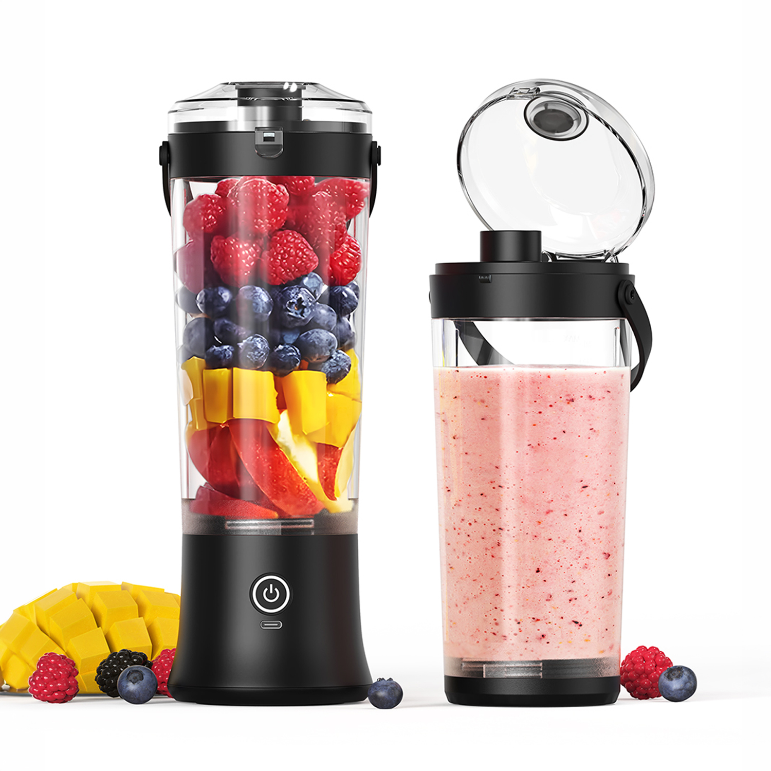 Una licuadora negra con bayas y mango, al lado un vaso de batido.