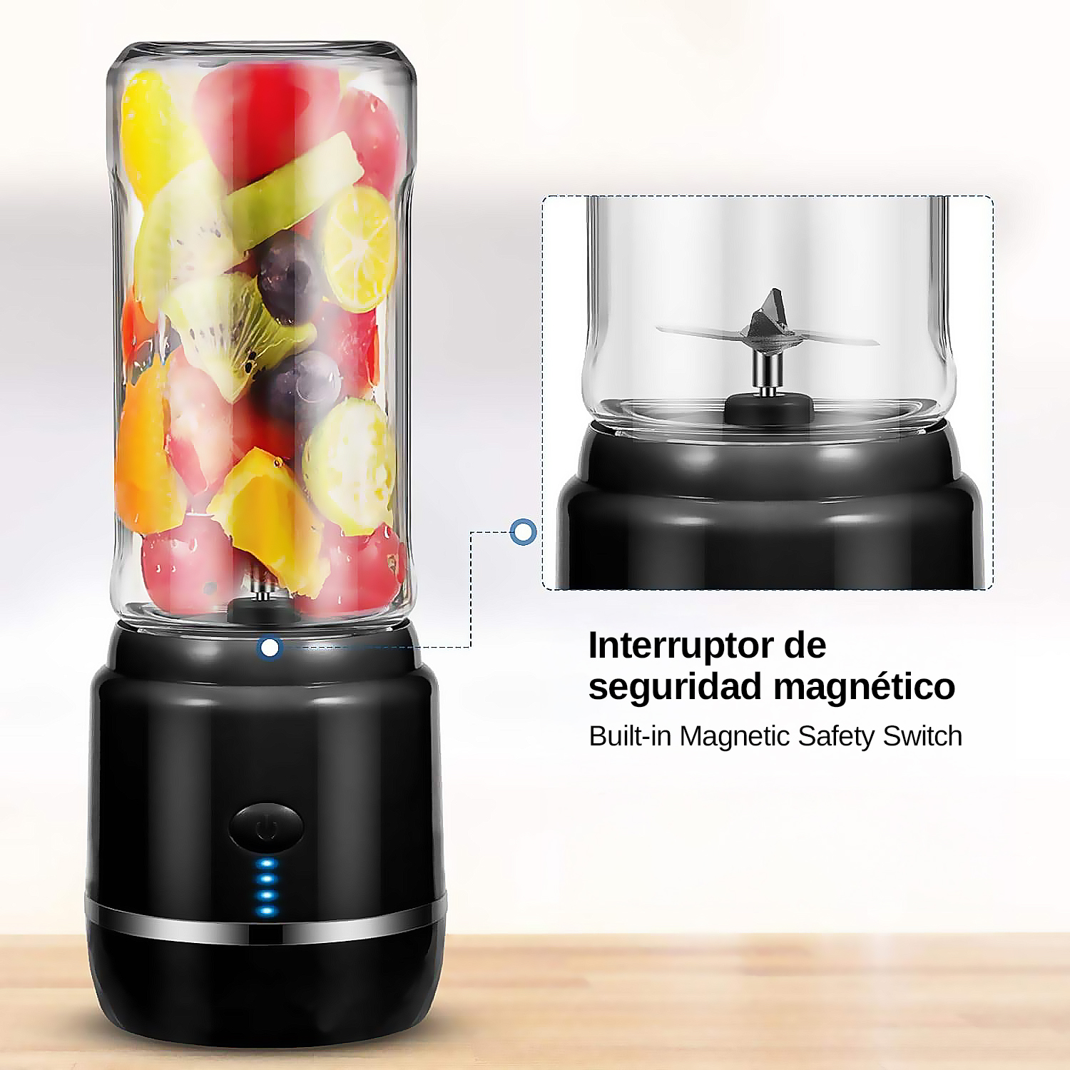 Una licuadora portátil con base negra y vaso transparente lleno de fruta colorida.