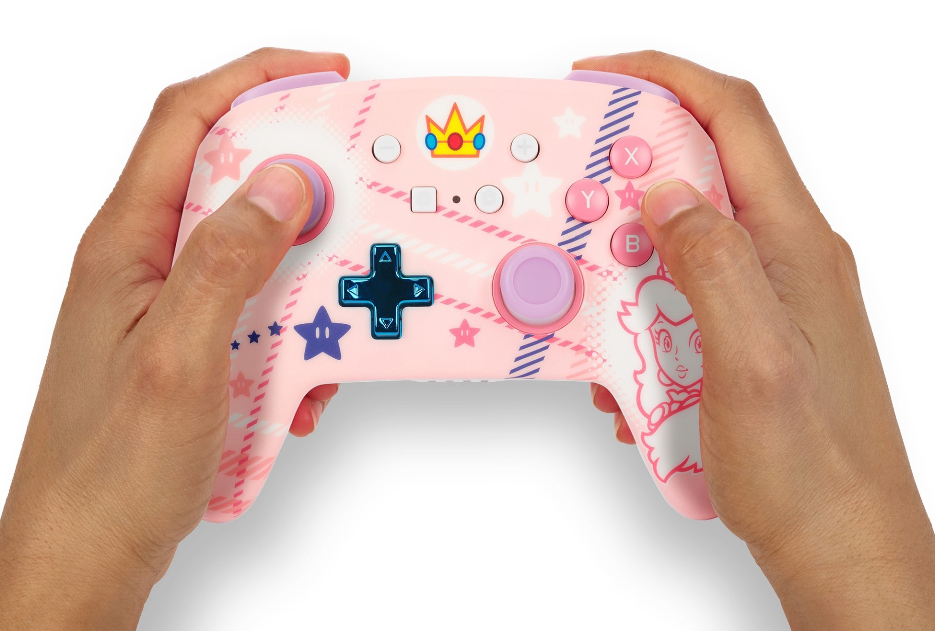 Hände halten eine rosa Nintendo Switch Pro Controller mit Prinzessin Peach-Motiv.
