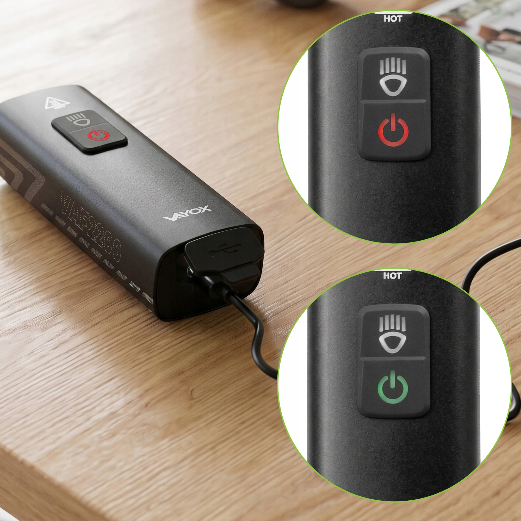 Czarne urządzenie Vayox VAF2200 ładuje się przez USB na drewnianym stole.
