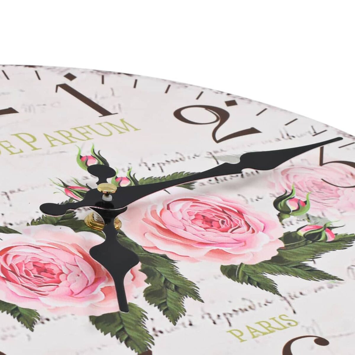 Eine Nahaufnahme einer Wanduhr mit rosa Rosen und Blättern, mit "PARIS" und "PARFUM" beschriftet.