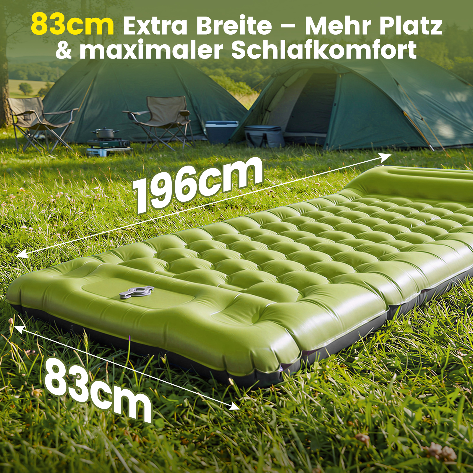 Grüne Luftmatratze 196x83cm im Gras, zwei Zelte im Hintergrund.