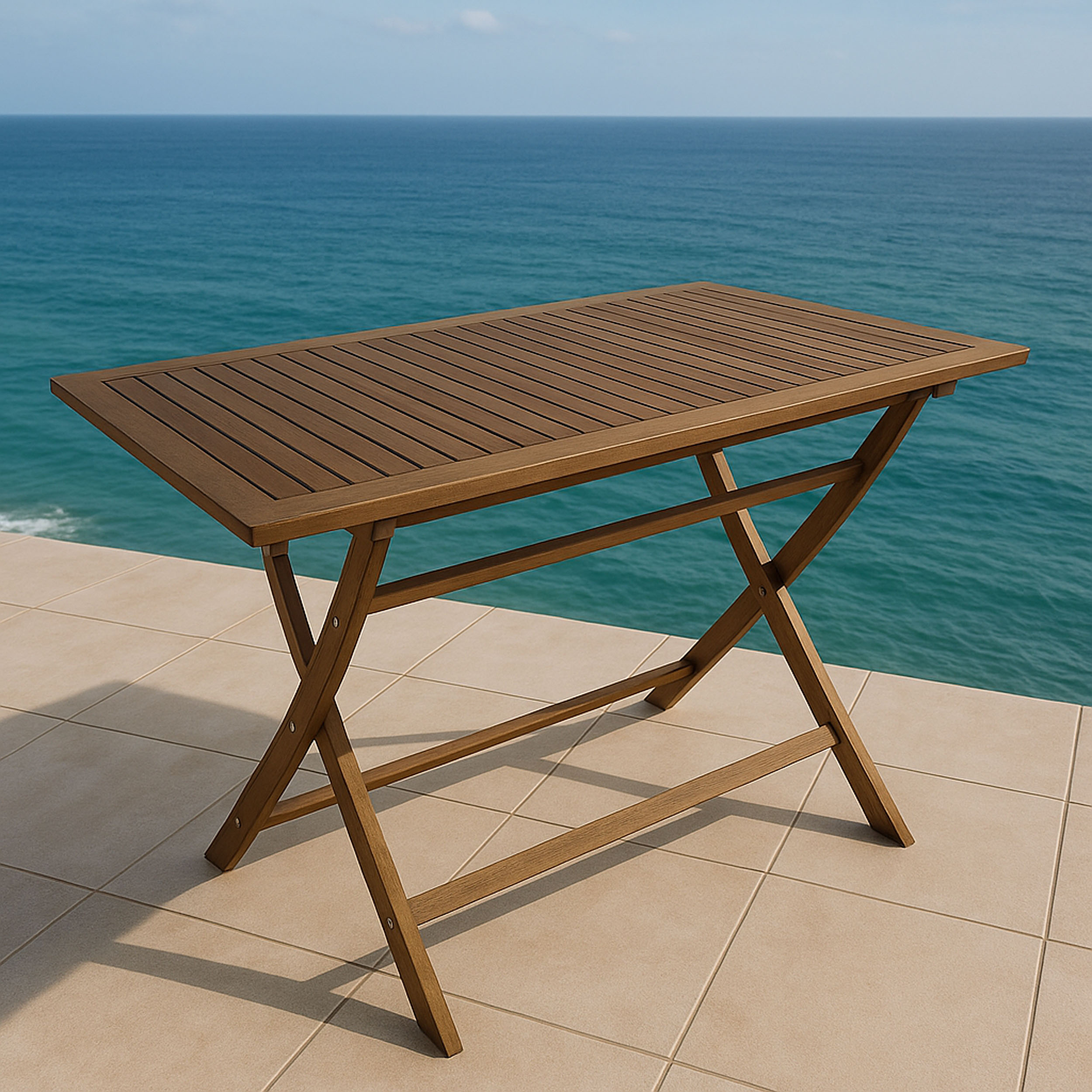 Ein brauner Holztisch steht auf einer gefliesten Terrasse am Meer.