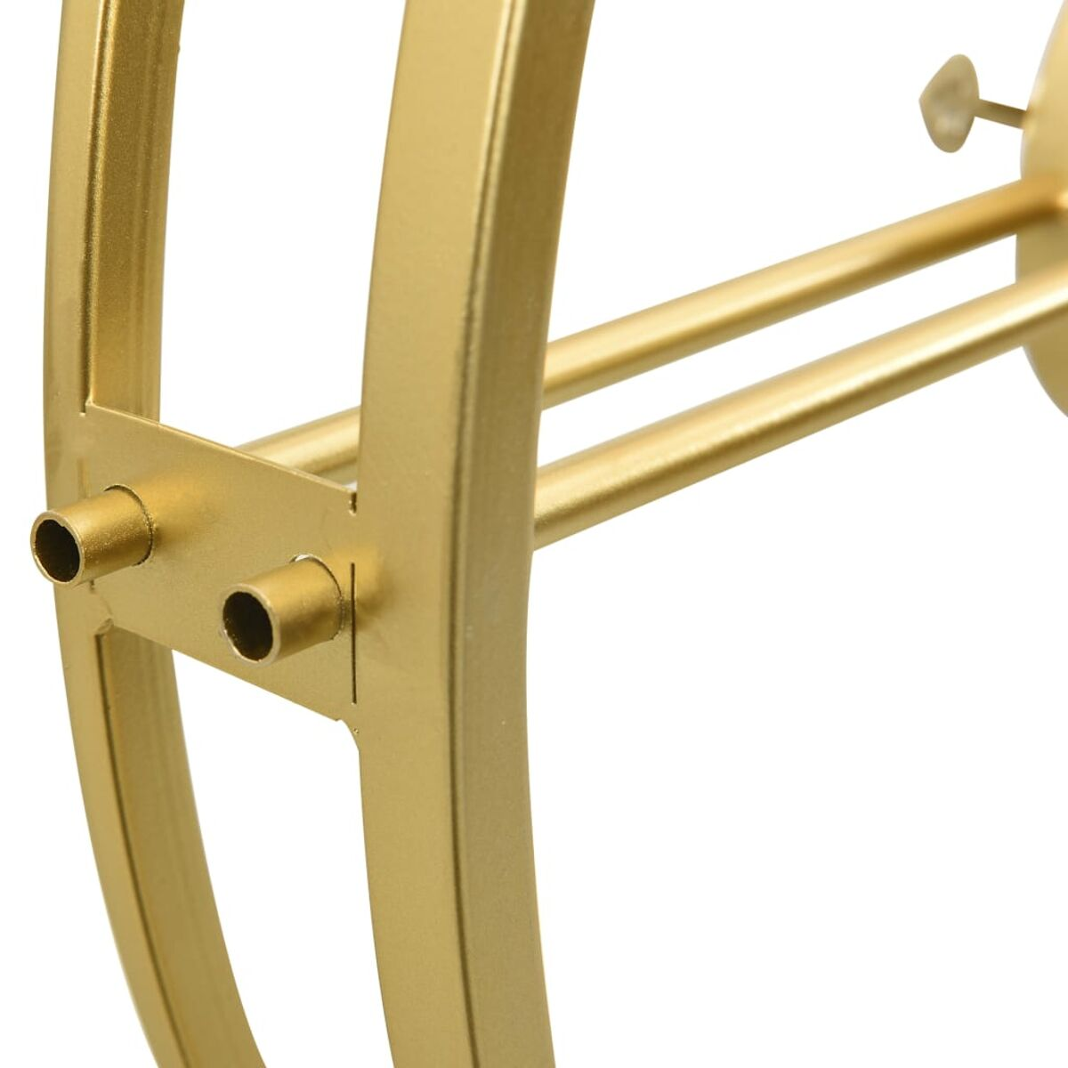 Goldener Metallrahmen mit zwei Röhren und einer kleinen Scheibe.