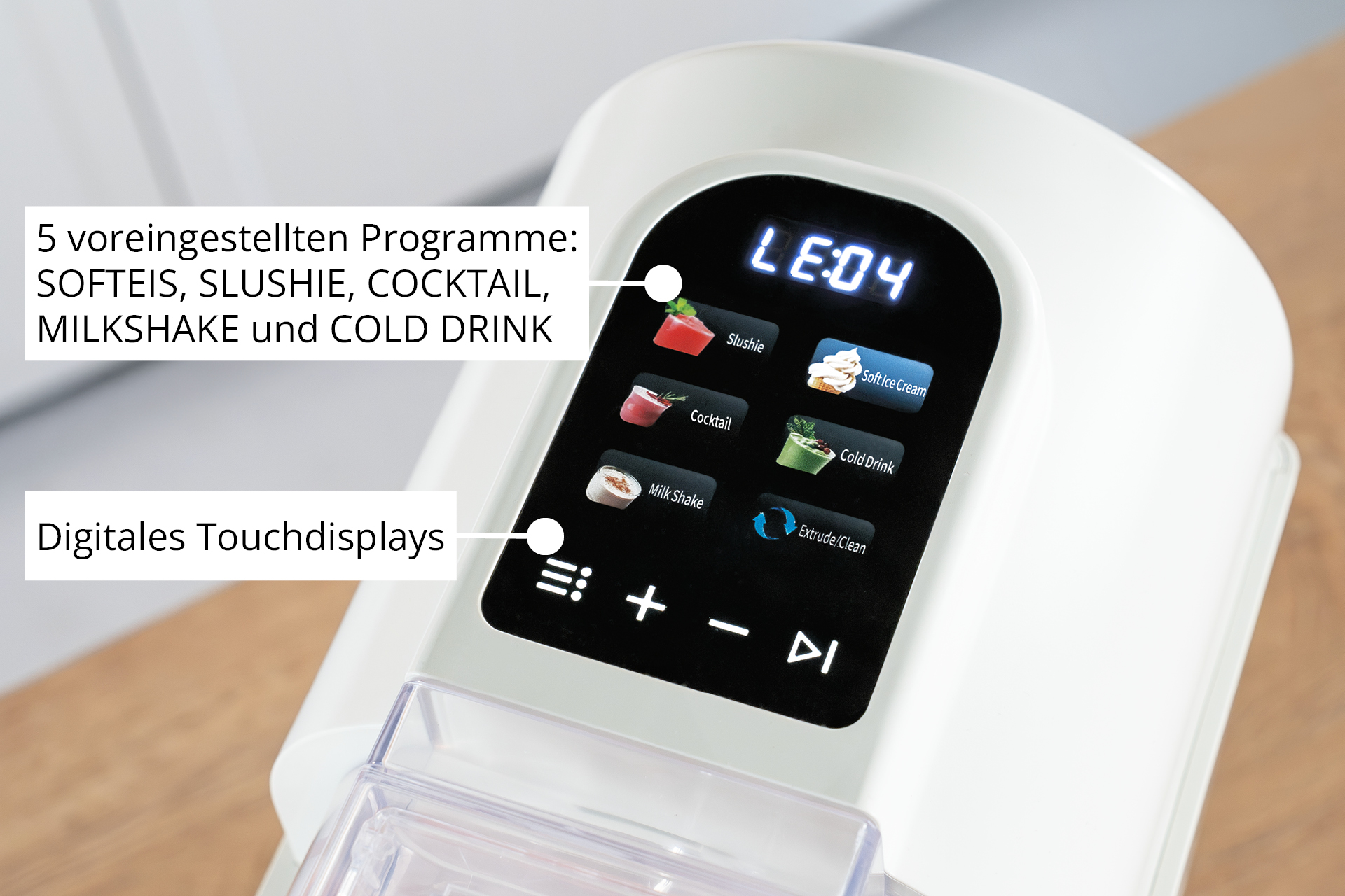 Un apparecchio bianco con touchscreen digitale che mostra icone di programmi come Slushie e Soft Ice Cream.