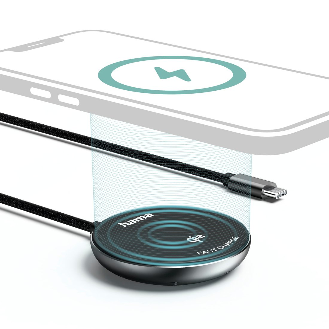Una base di ricarica rotonda Hama Qi carica uno smartphone in modalità wireless.