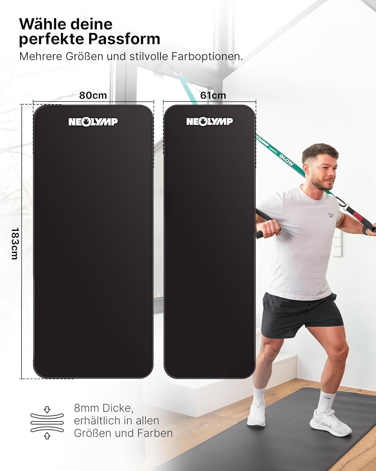 Zwei schwarze Matten, eine 80cm und eine 61cm breit, 183cm lang. Mann trainiert mit Seilzug.